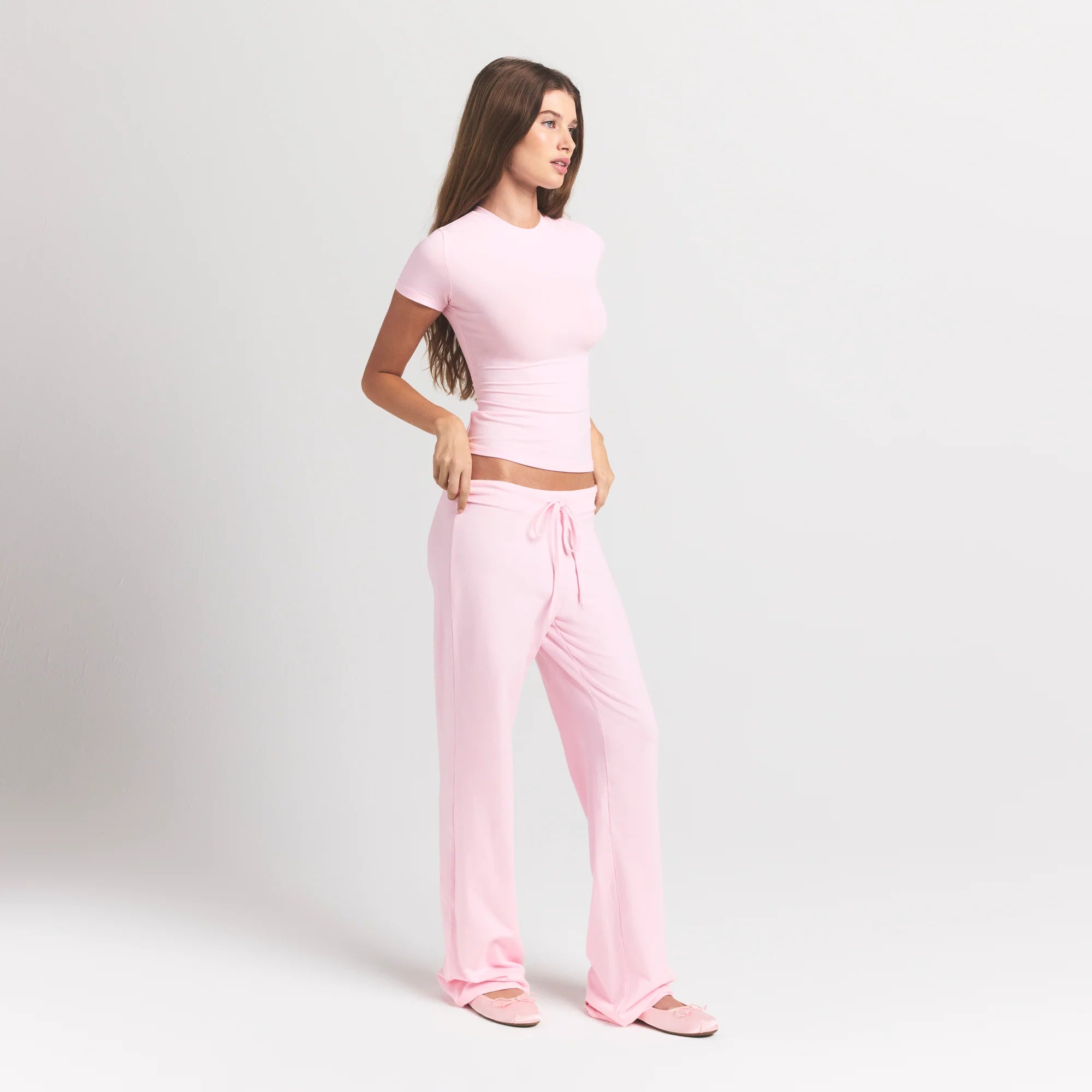 COTTON JERSEY STRAIGHT LEG PANT | CHERRY BLOSSOM ON A MODEL SIDE VIEW @ | FOCUS: 0.9, 0.1, 0.7