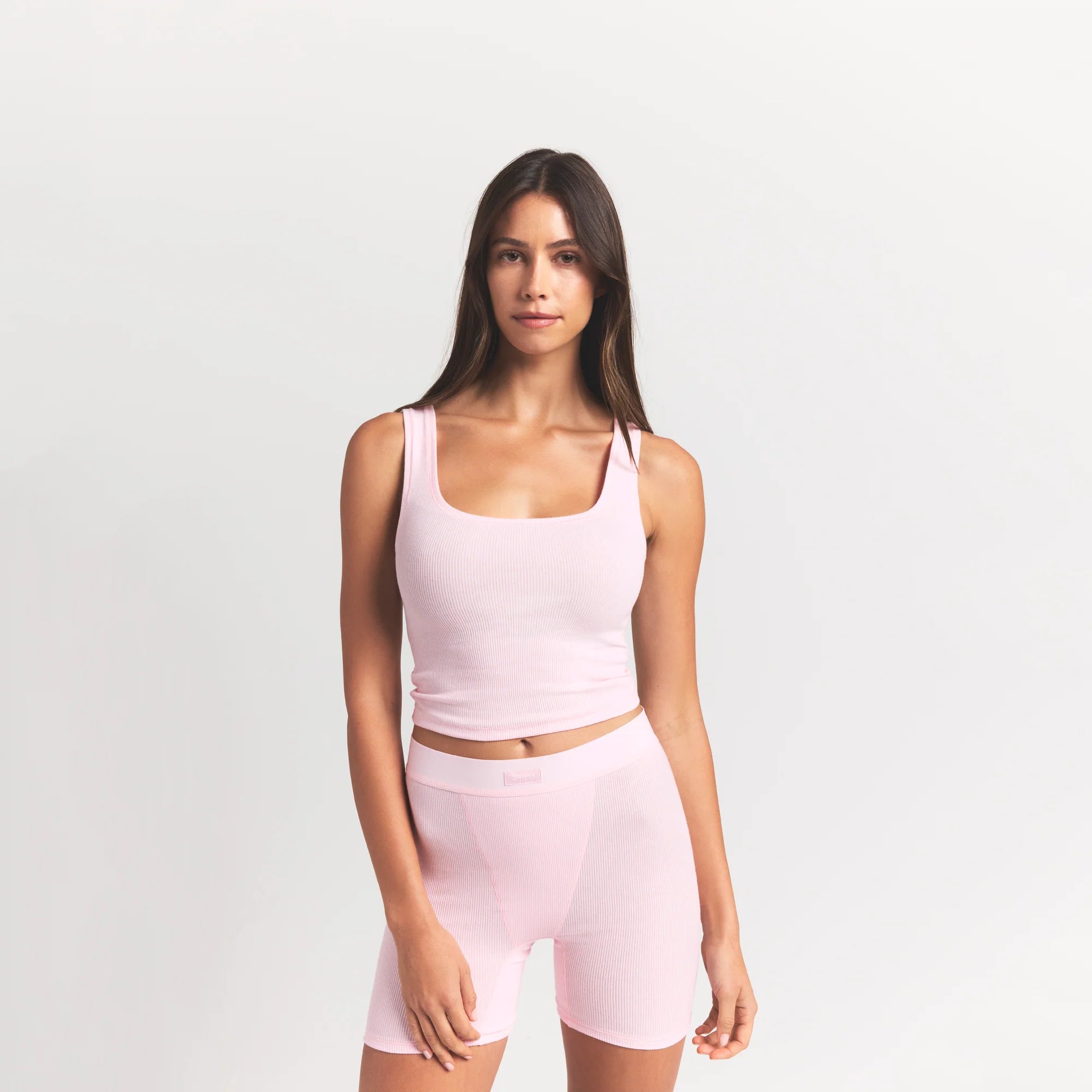 COTTON RIB TANK | CHERRY BLOSSOM ON A MODEL FRONT VIEW @ | FOCUS: 0.9, 0.1, 0.7