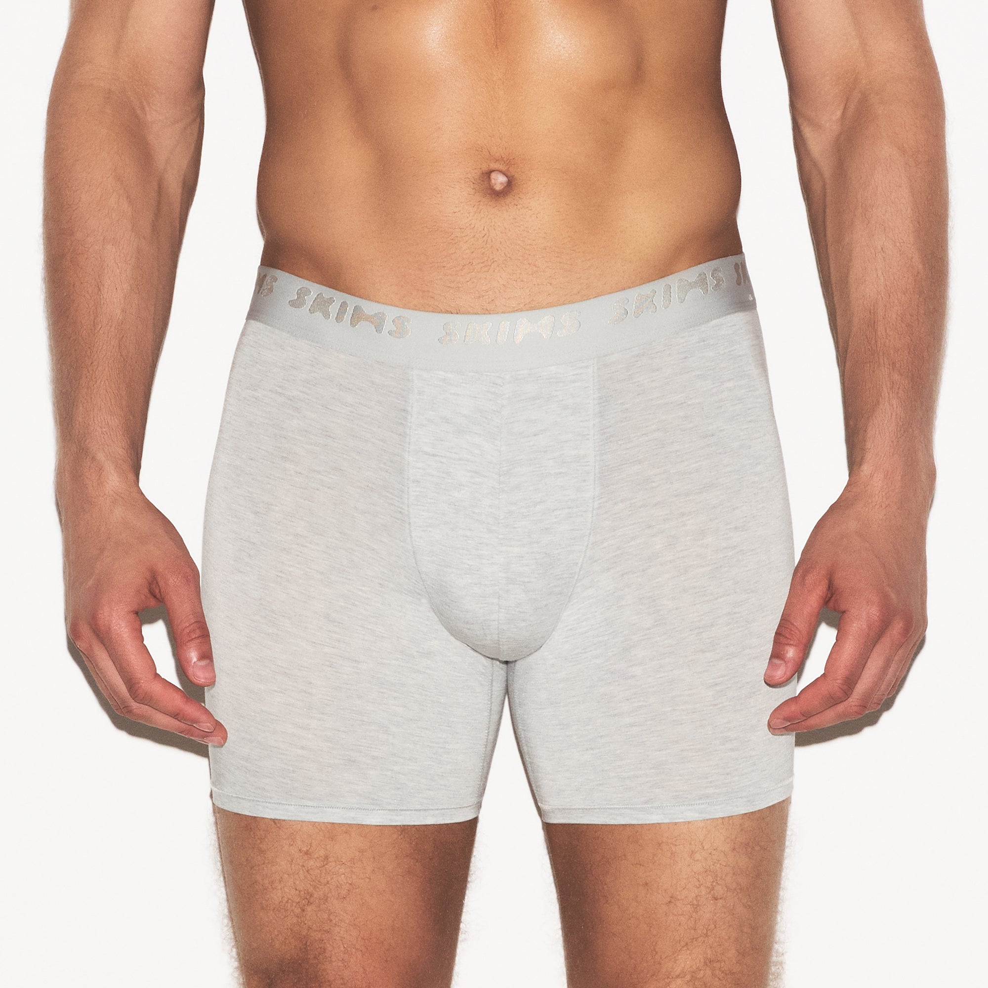 SKIMS STRETCH MENS 3 INCH BOXER BRIEF 3-PACK | LAUREL MULTI ON A MODEL SIDE VIEW | FOCUS: 0.0, 1.0, 0.9