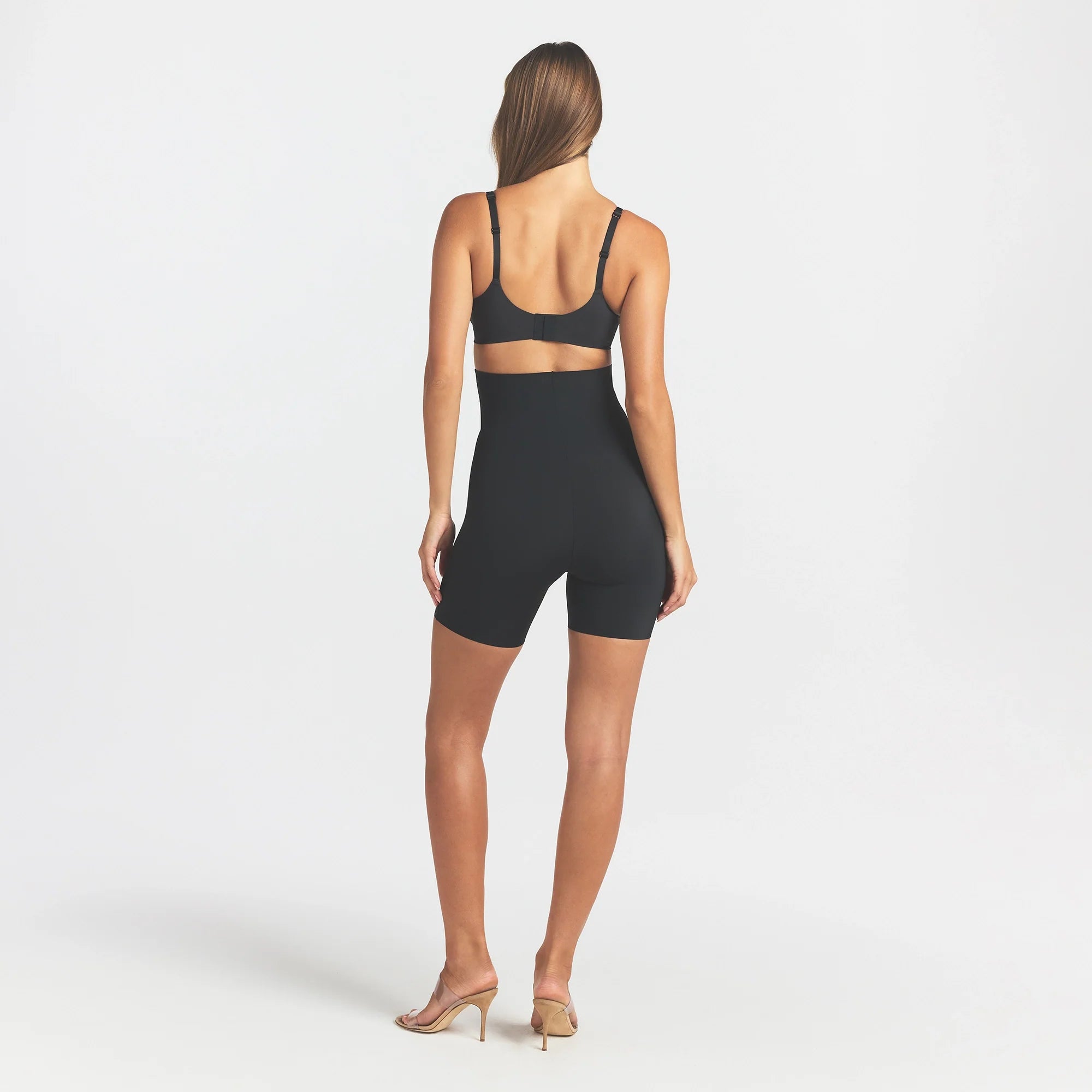 COOL SHAPEWEAR HIGH-WAISTED SHORT | ONYX ON A MODEL BACK VIEW @ | FOCUS: 0.0, 1.0, 0.9