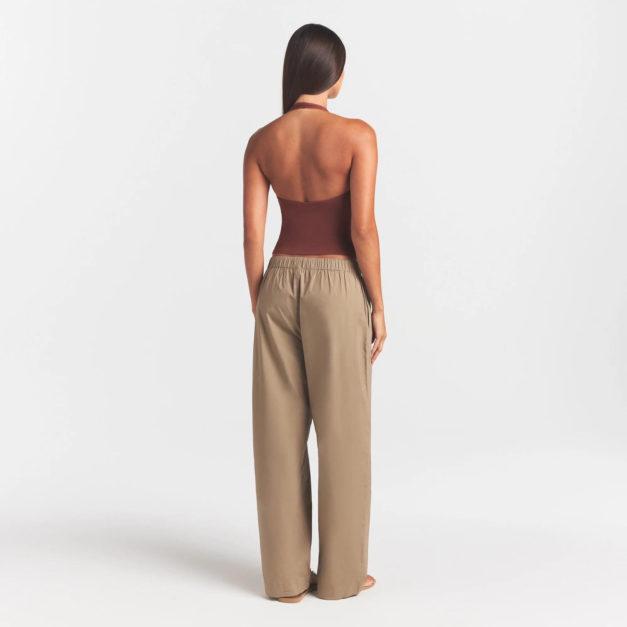 WOVEN COTTON OVERSIZED STRAIGHT LEG PANT | DESERT ON A MODEL FRONT VIEW @ | FOCUS: 0.0, 1.0, 0.9