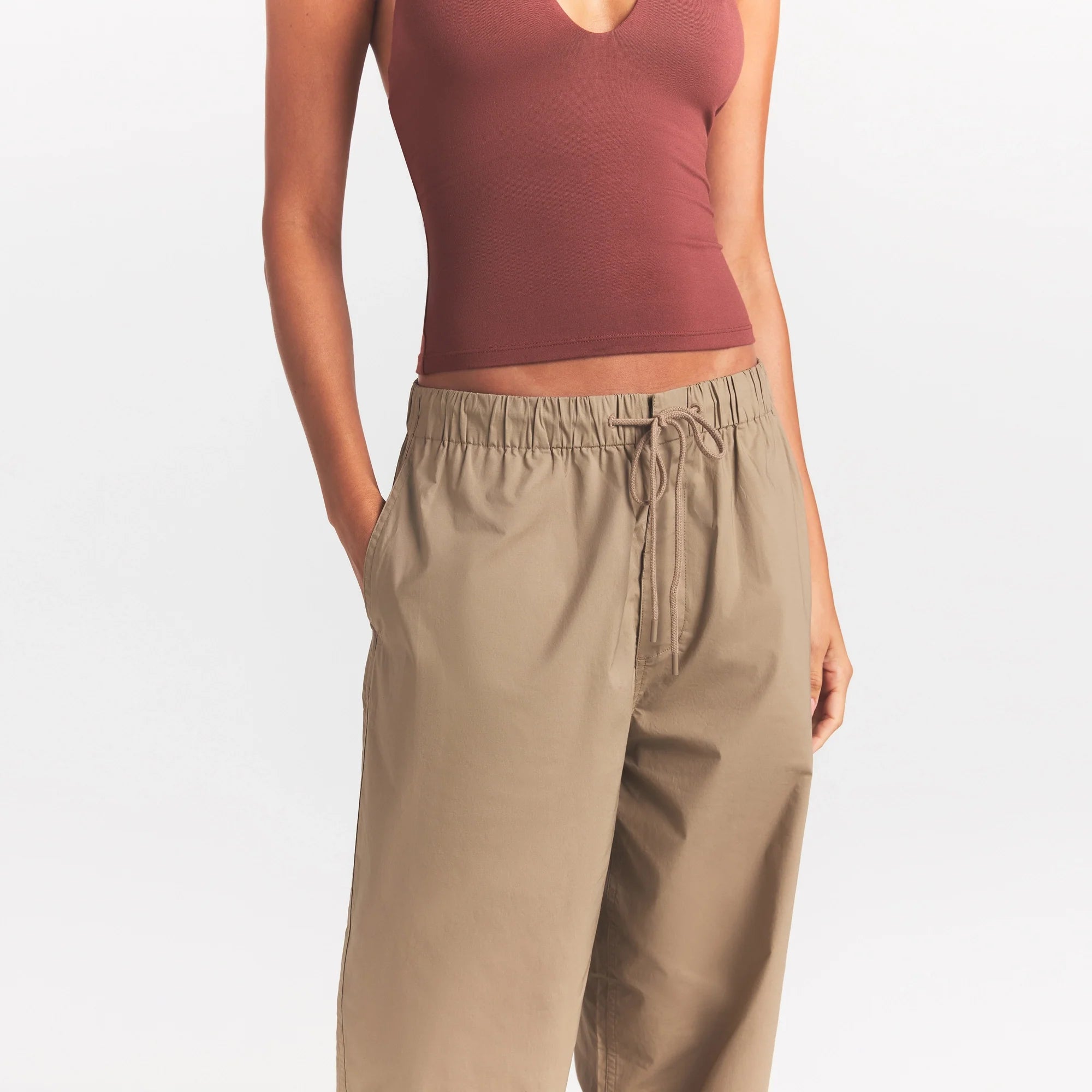WOVEN COTTON OVERSIZED STRAIGHT LEG PANT | DESERT ON A MODEL SIDE VIEW @ | FOCUS: 0.0, 1.0, 0.9