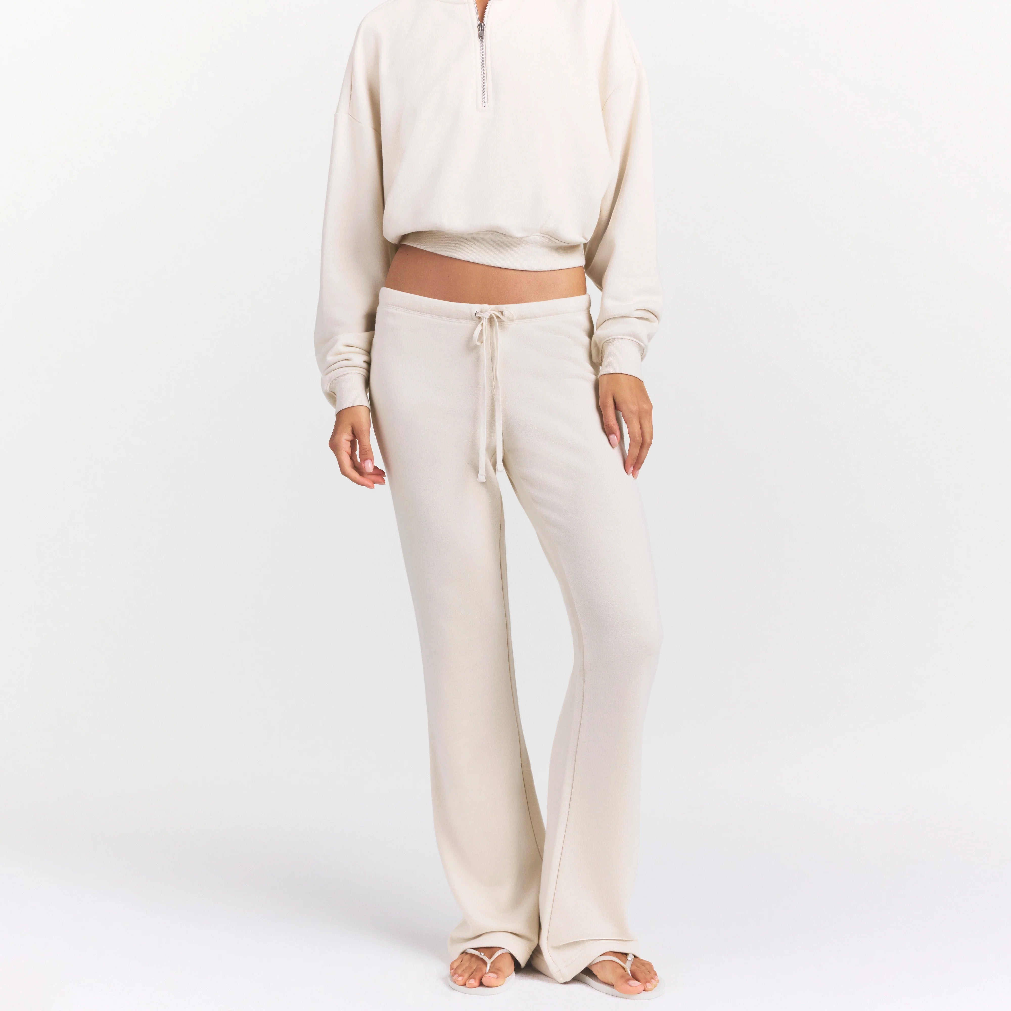 DRAPEY FRENCH TERRY STRAIGHT LEG PANT | BUFF ON A MODEL SIDE VIEW @ | FOCUS: 0.0, 1.0, 0.9