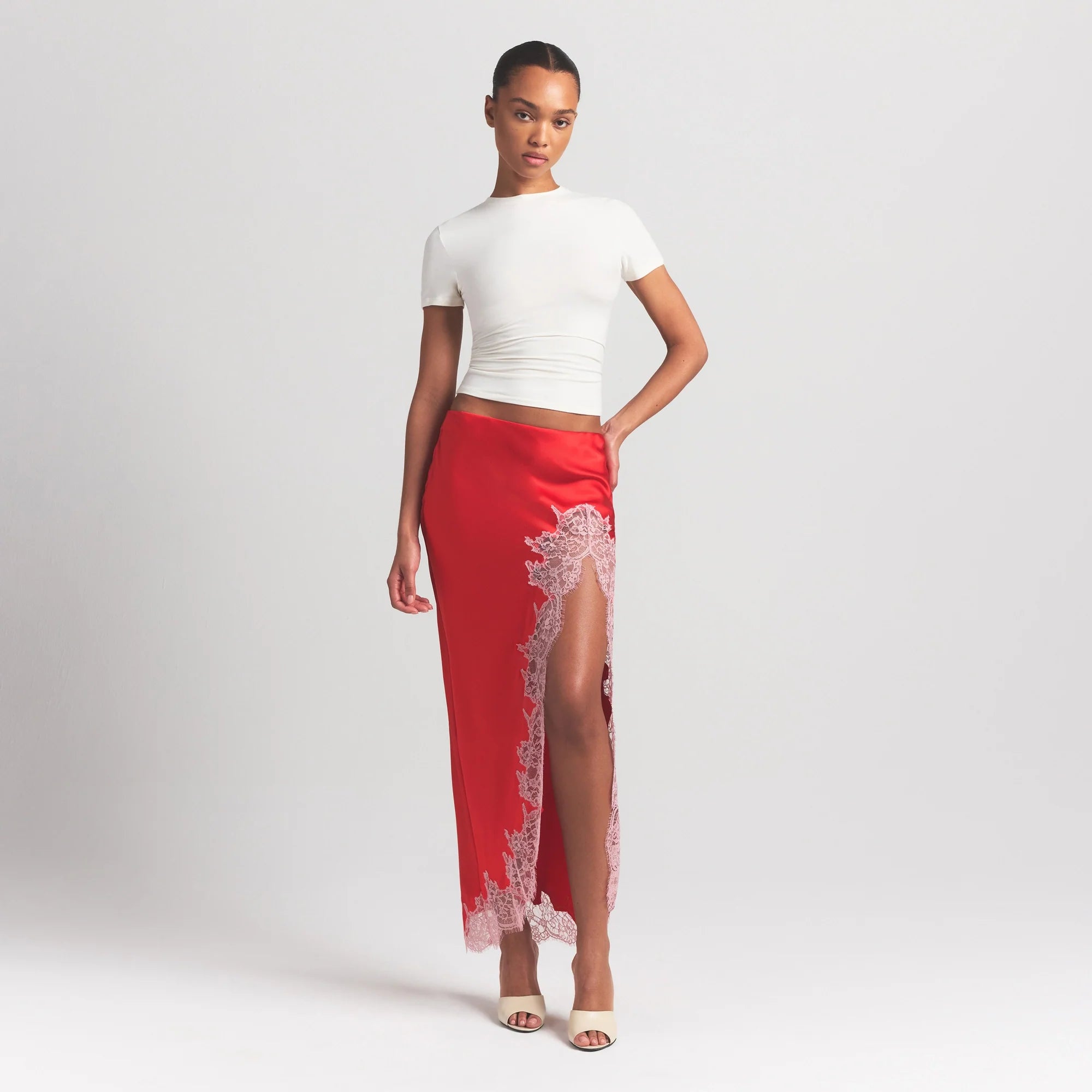 SILK LACE SKIRT | RUBY CONTRAST ON A MODEL FRONT VIEW @ | FOCUS: 0.0, 1.0, 0.9