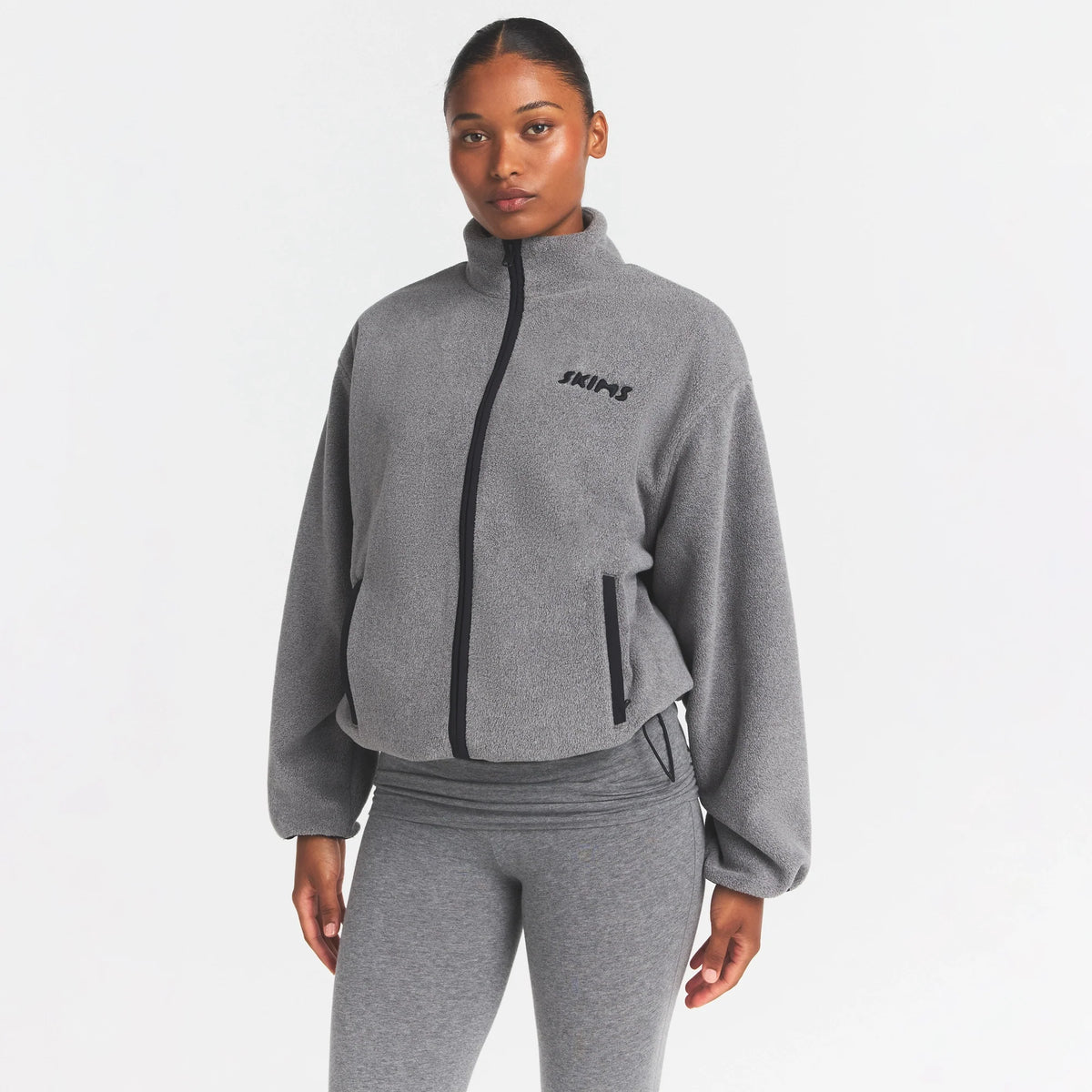 OUTDOOR FLEECE MOCK NECK ZIP UP JACKET | DARK HEATHER GREY ON A MODEL SIDE VIEW @ | FOCUS: 0.0, 1.0, 0.9