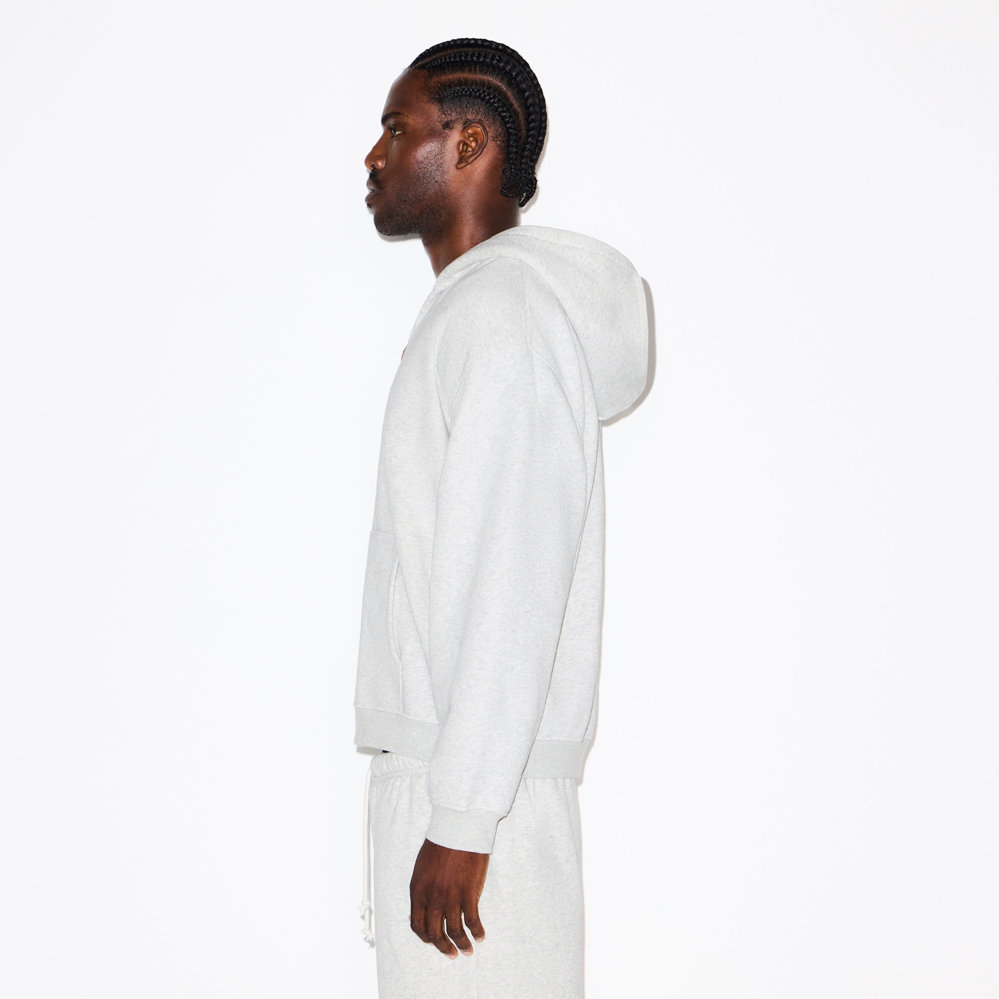 FLEECE LOUNGE MENS RELAXED ZIP UP HOODIE | LIGHT HEATHER GREY ON A MODEL SIDE VIEW @ | FOCUS: 0.0, 1.0, 0.9