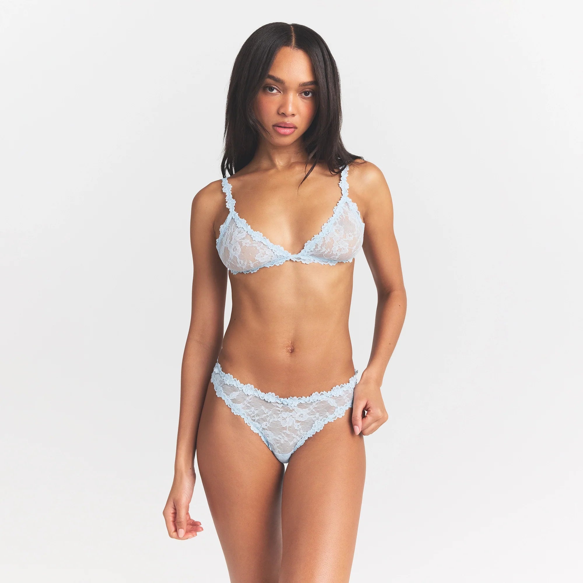 STRETCH LACE DIPPED THONG | POWDER BLUE ON A MODEL FRONT VIEW @ | FOCUS: 0.0, 1.0, 0.9