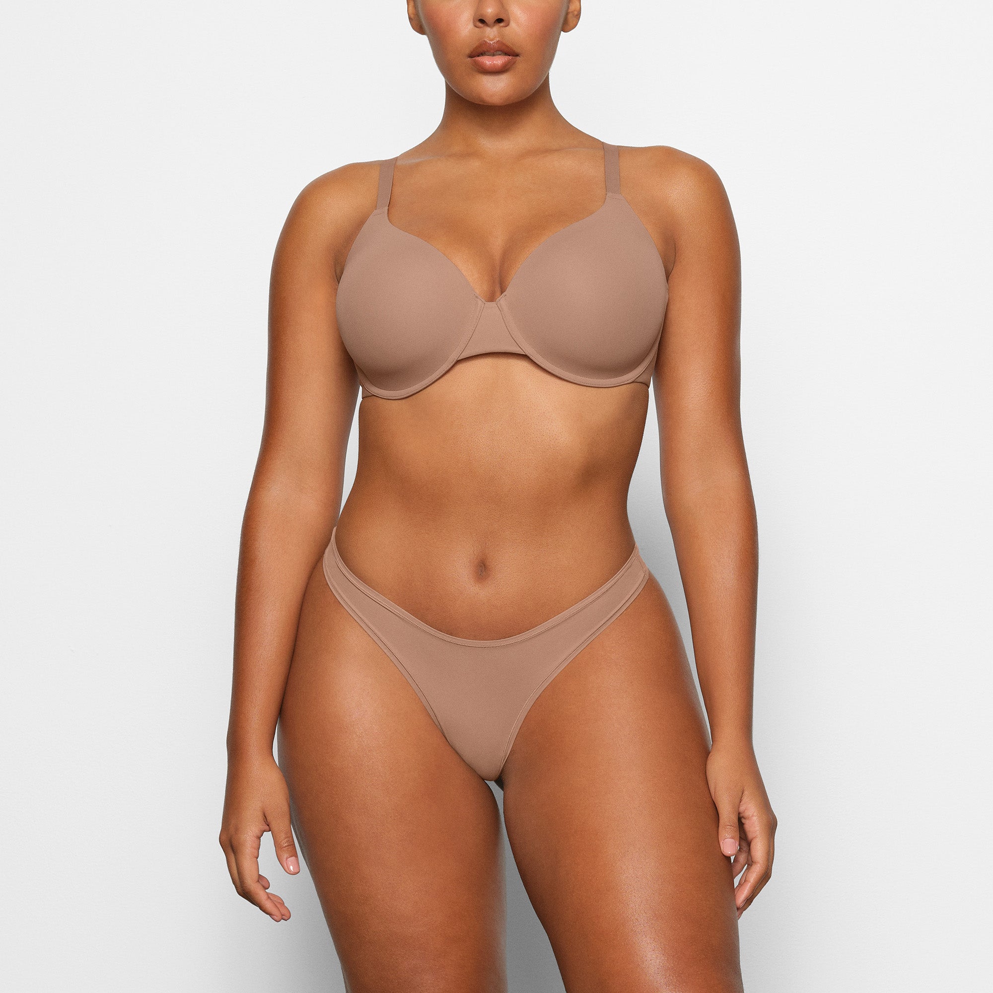 FITS EVERYBODY T-SHIRT DEMI BRA WORN BY A MODEL IN FRONT VIEW