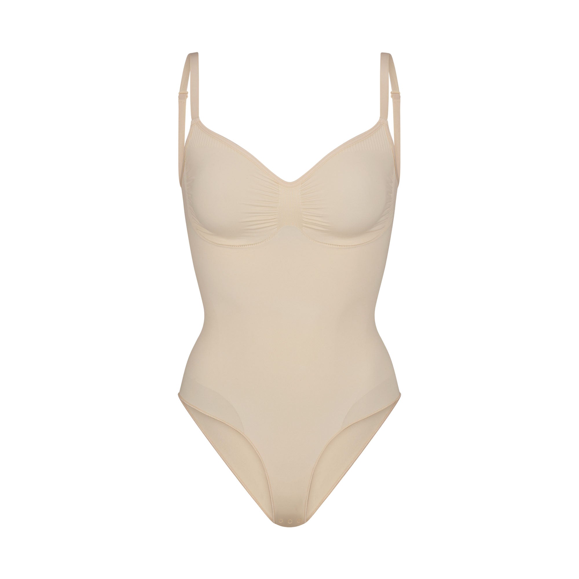 SEAMLESS SCULPT BRIEF BODYSUIT | SAND (SHAPEWEAR BODYSUITS) LAYS FLAT ON A WHITE BACKGROUND | FLT