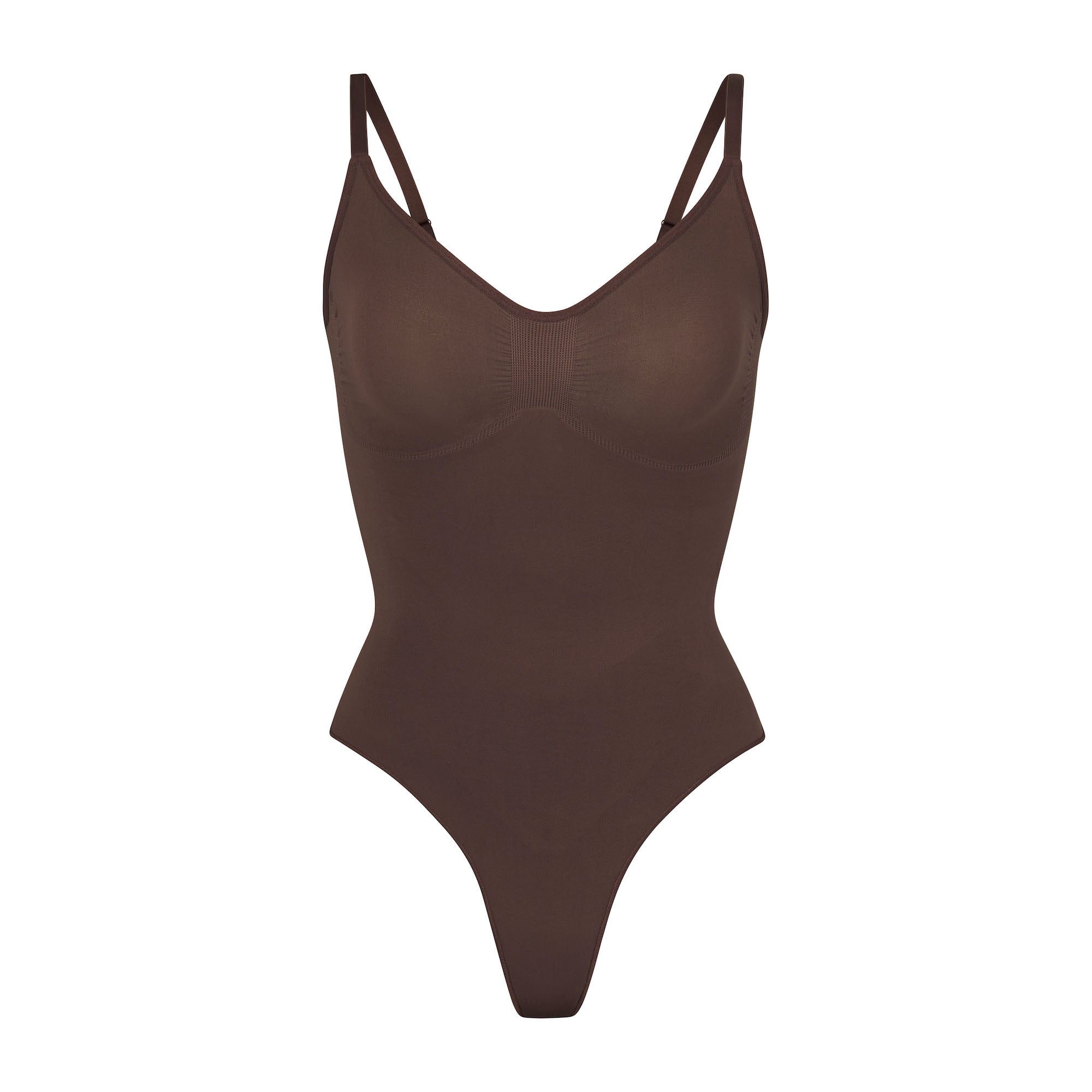 SEAMLESS SCULPT THONG BODYSUIT | COCOA (SHAPEWEAR BODYSUITS) LAYS FLAT ON A WHITE BACKGROUND | FLT