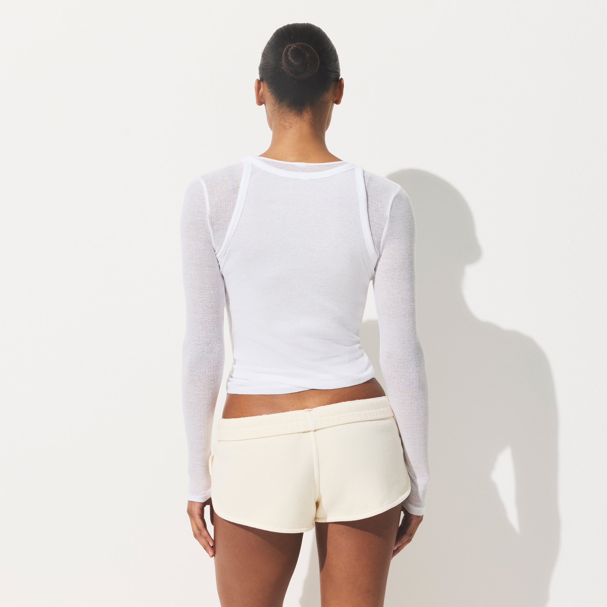 SHEER COTTON TANK | SNOW ON A MODEL SIDE VIEW | FOCUS: 0.0, 1.0, 0.9