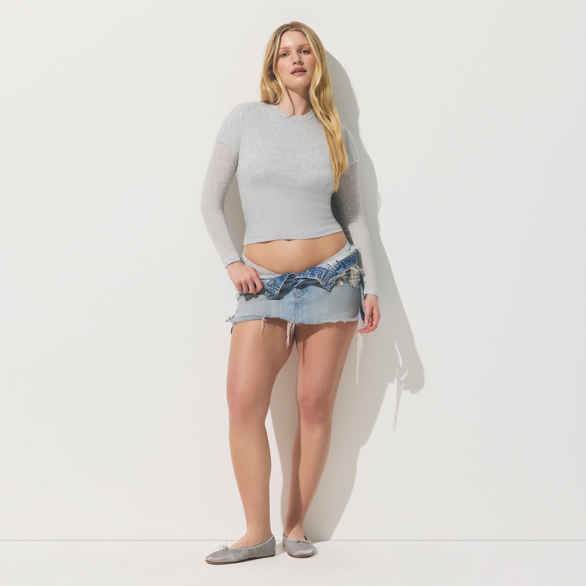 SHEER COTTON T-SHIRT | LIGHT HEATHER GREY ON A MODEL FRONT VIEW | FOCUS: 0.0, 1.0, 0.9