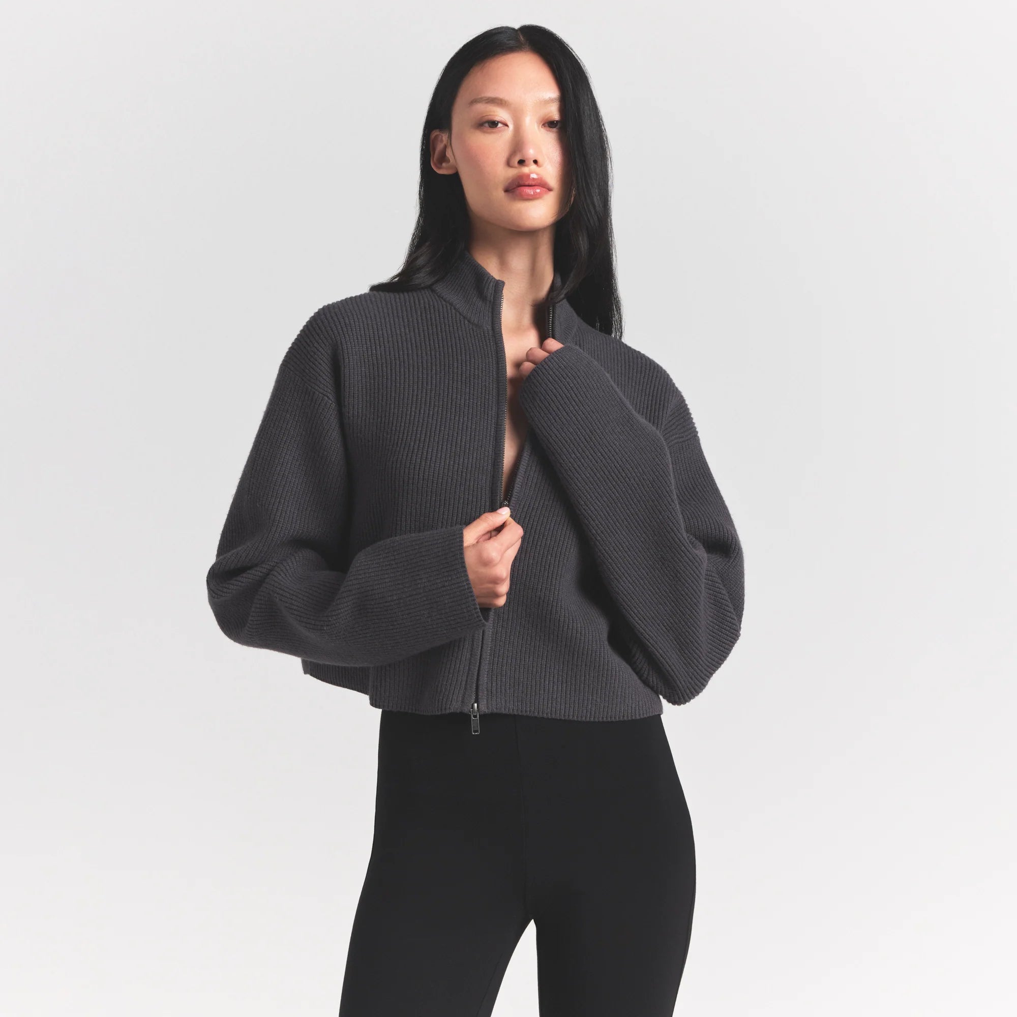 SWEATER KNITS MOCK NECK ZIP UP | ASH ON A MODEL SIDE VIEW @ | FOCUS: 0.0, 1.0, 0.9