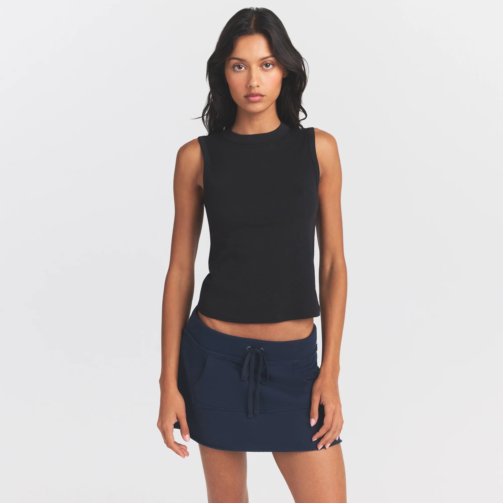 WORN IN JERSEY HIGH CREW TANK | WASHED ONYX ON A MODEL SIDE VIEW @ | FOCUS: 0.0, 1.0, 0.9