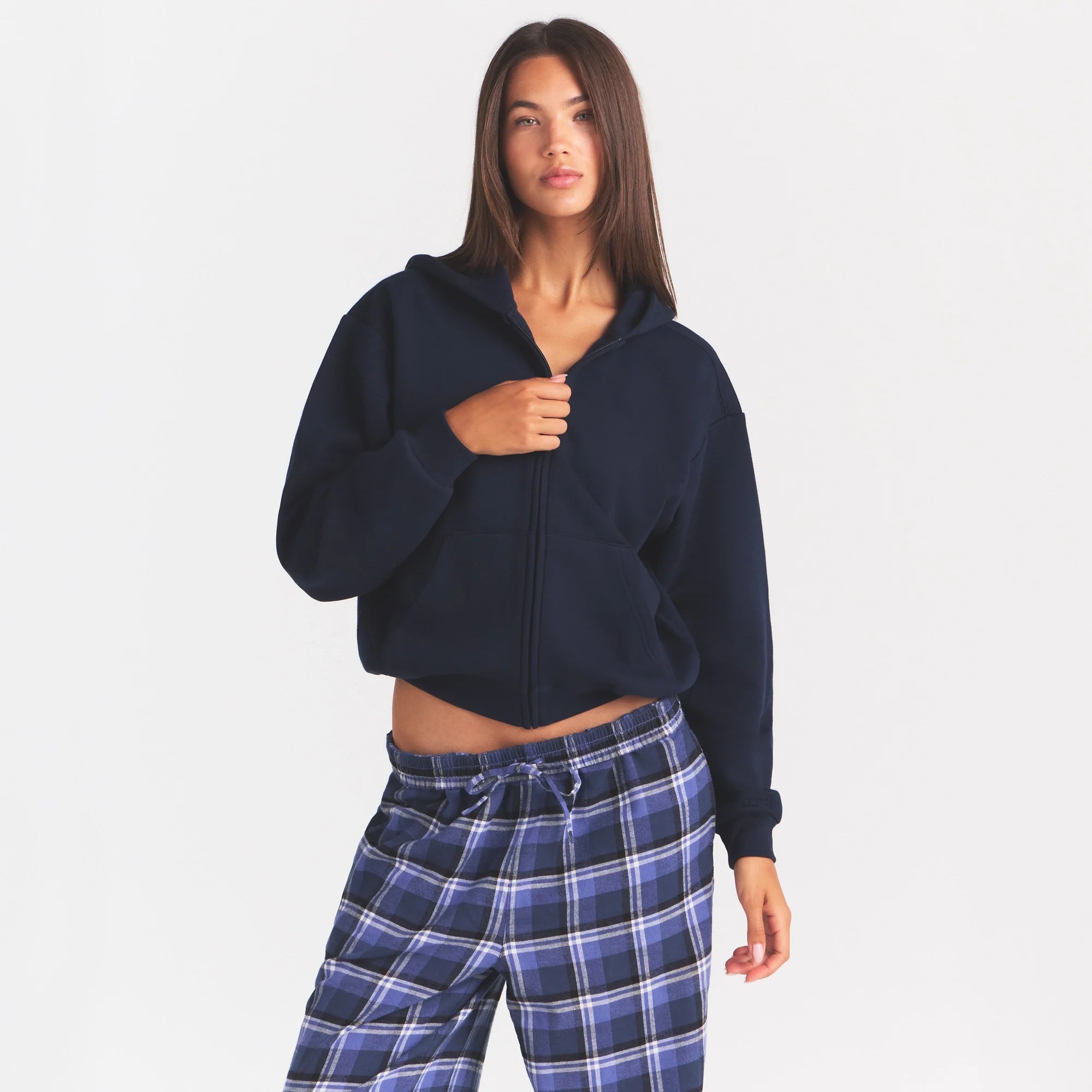 COTTON FLEECE CLASSIC ZIP UP HOODIE | NAVY ON A MODEL SIDE VIEW