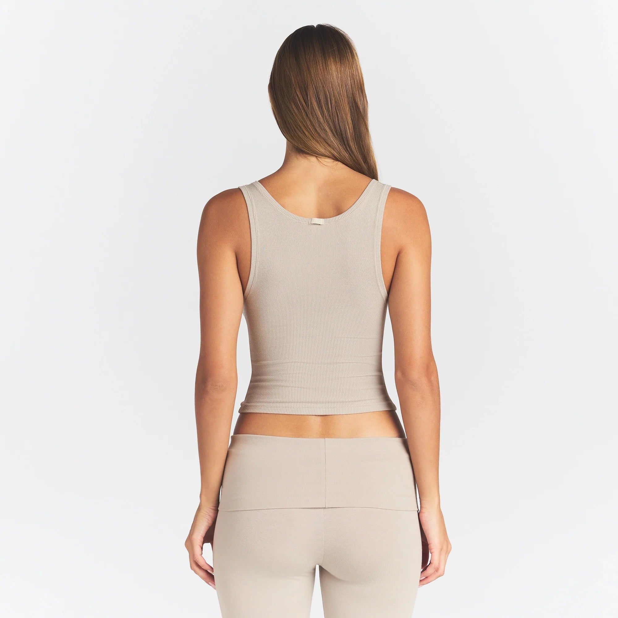 COTTON RIB TANK | STONE ON A MODEL BACK VIEW @ | FOCUS: 0.0, 1.0, 0.9