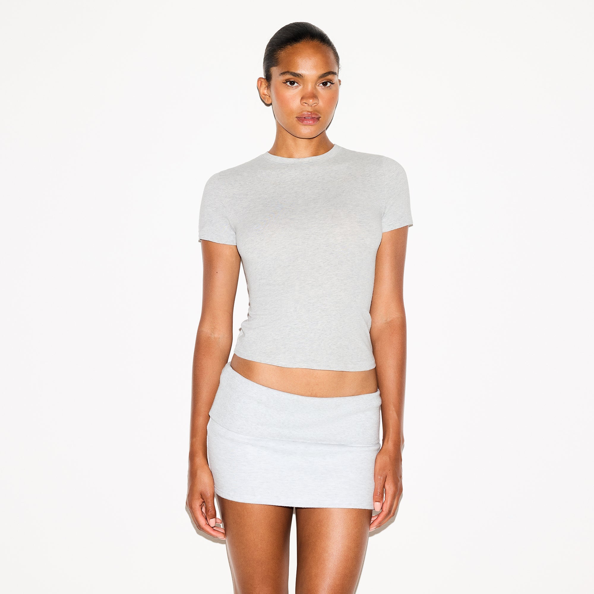 COTTON JERSEY T-SHIRT | LIGHT HEATHER GREY ON A MODEL SIDE VIEW