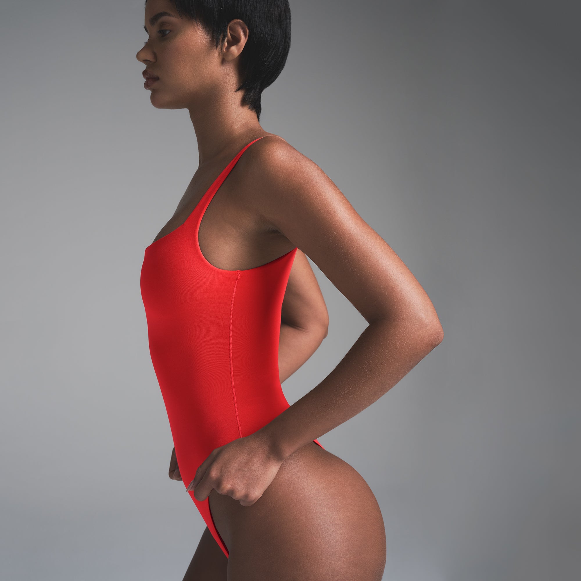FITS EVERYBODY SQUARE NECK BODYSUIT | CHERRY ON A MODEL SIDE VIEW | FOCUS: 0.0, 1.0, 0.9