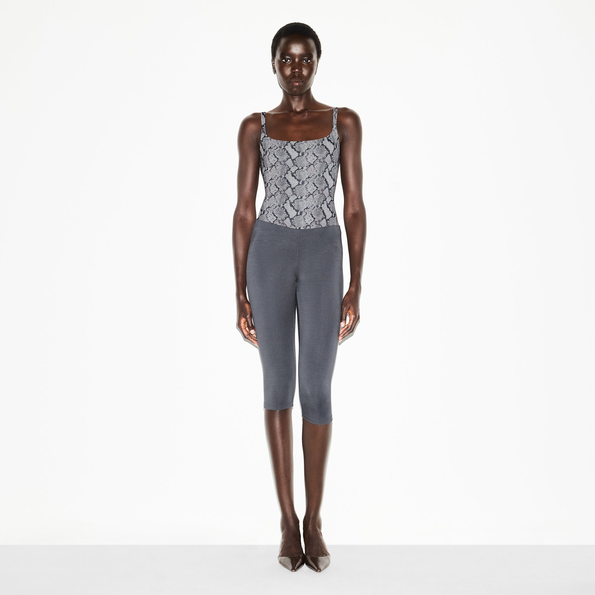 FITS EVERYBODY SQUARE NECK BODYSUIT | SHADOW SNAKE PRINT ON A MODEL FRONT VIEW @ | FOCUS: 0.0, 1.0, 0.9