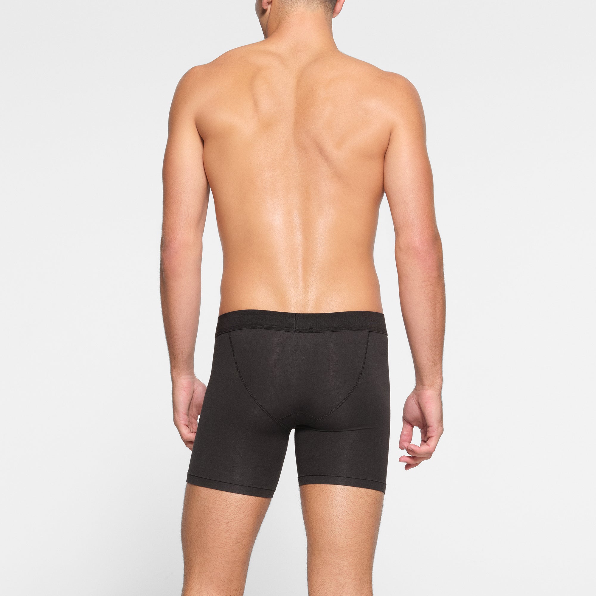 SKIMS COTTON MENS 5" BOXER BRIEF 3-PACK ON A MODEL BACK VIEW