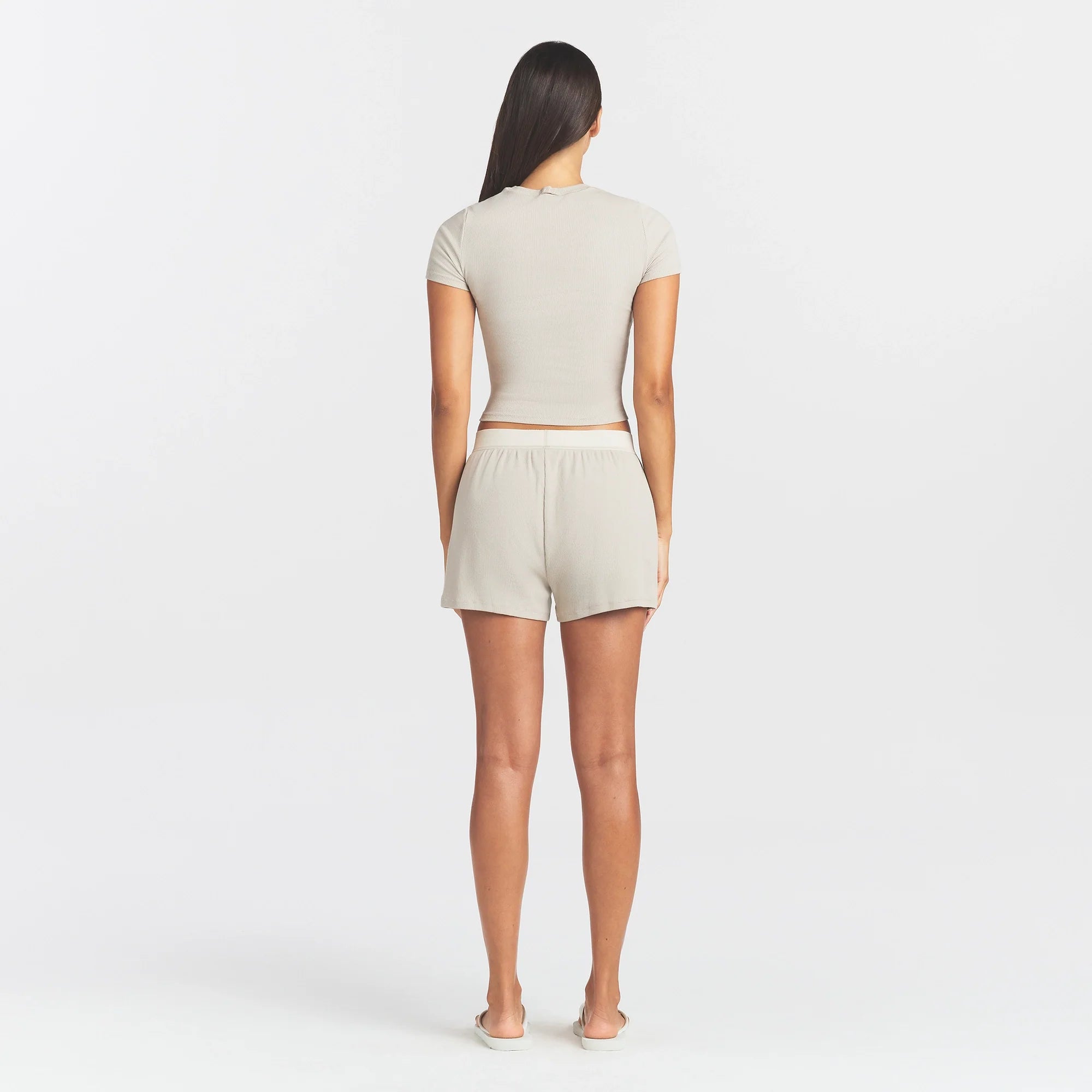 COTTON RIB LOOSE BOXER | STONE ON A MODEL BACK VIEW @ | FOCUS: 0.0, 1.0, 0.9