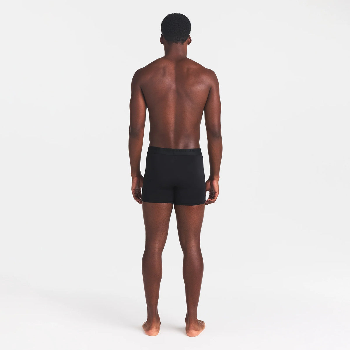 SKIMS STRETCH MENS 3" BOXER BRIEF | OBSIDIAN ON A MODEL BACK VIEW
