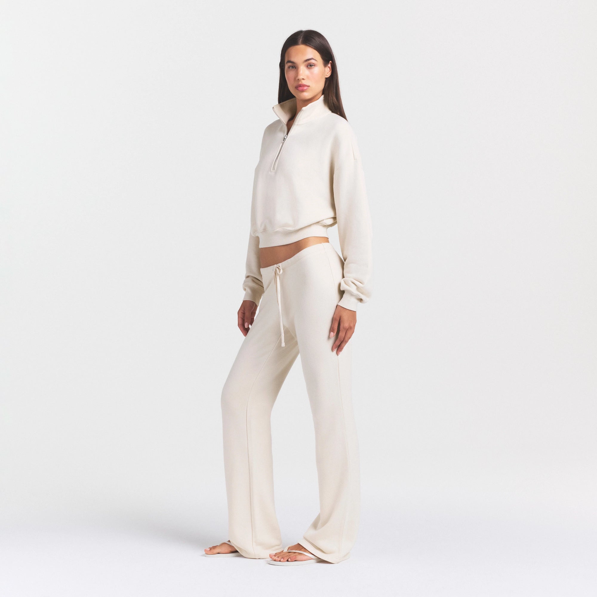 DRAPEY FRENCH TERRY STRAIGHT LEG PANT | BUFF ON A MODEL SIDE VIEW @ | FOCUS: 0.0, 1.0, 0.9