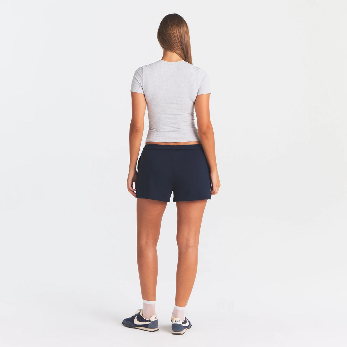 COTTON FLEECE CLASSIC SHORT | NAVY ON A MODEL FRONT VIEW