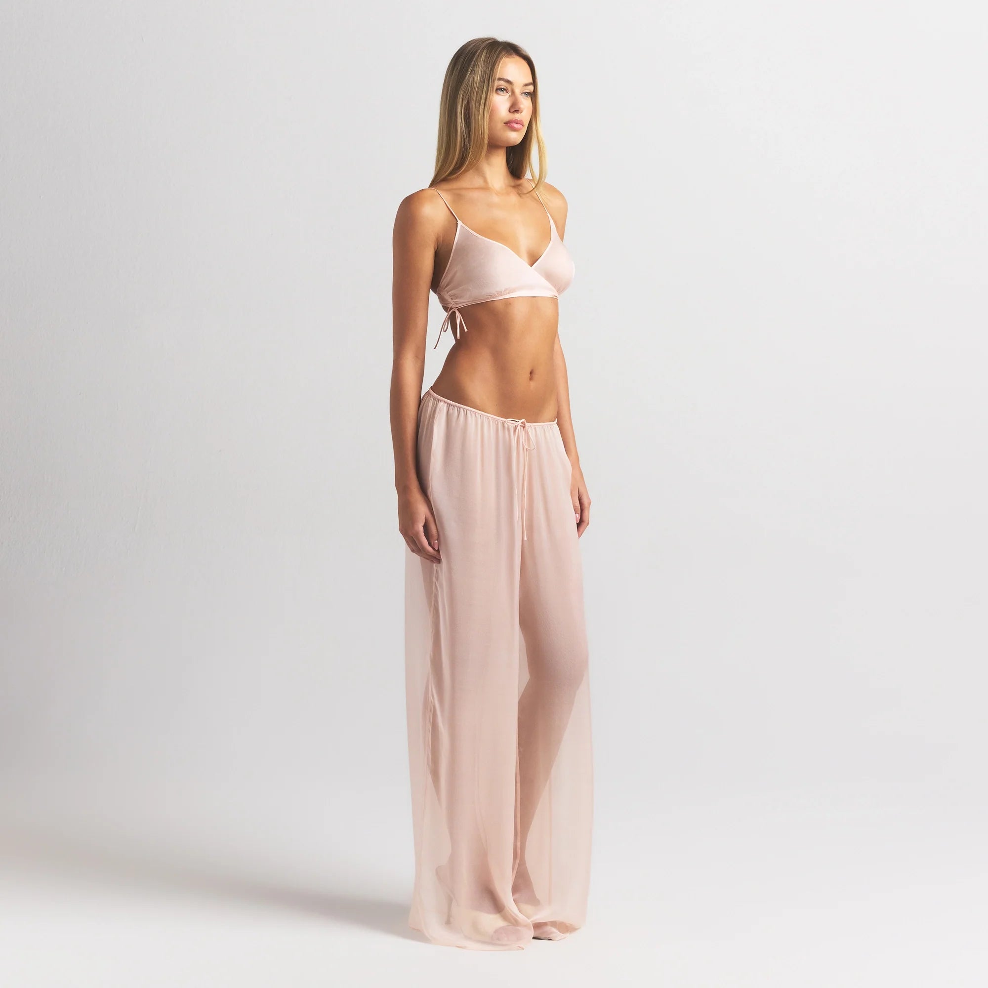 SKIMS ROMANCE WIDE LEG PANT | PRIMROSE ON A MODEL FRONT VIEW @ | FOCUS: 0.0, 1.0, 0.9