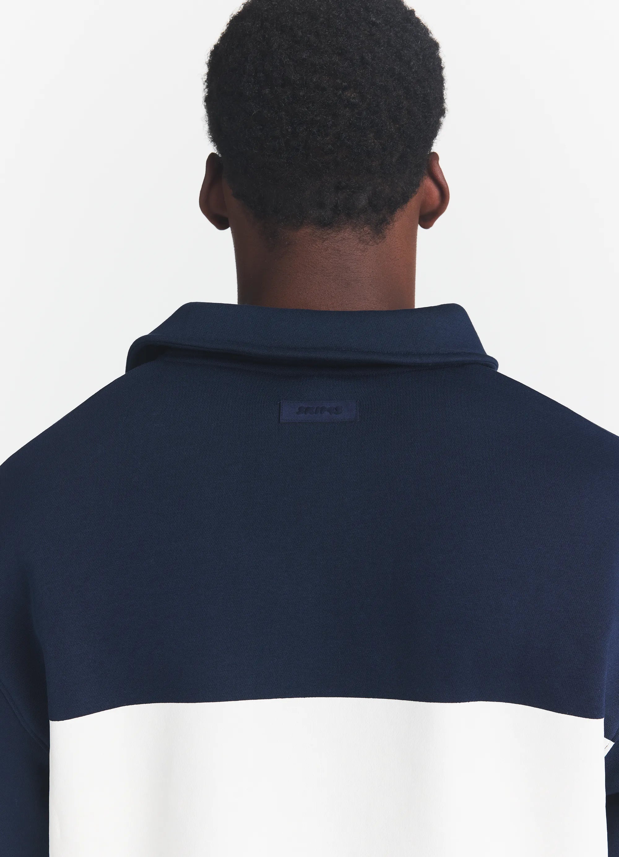 FLEECE LOUNGE MENS RUGBY POLO | NAVY ON A MODEL BACK VIEW