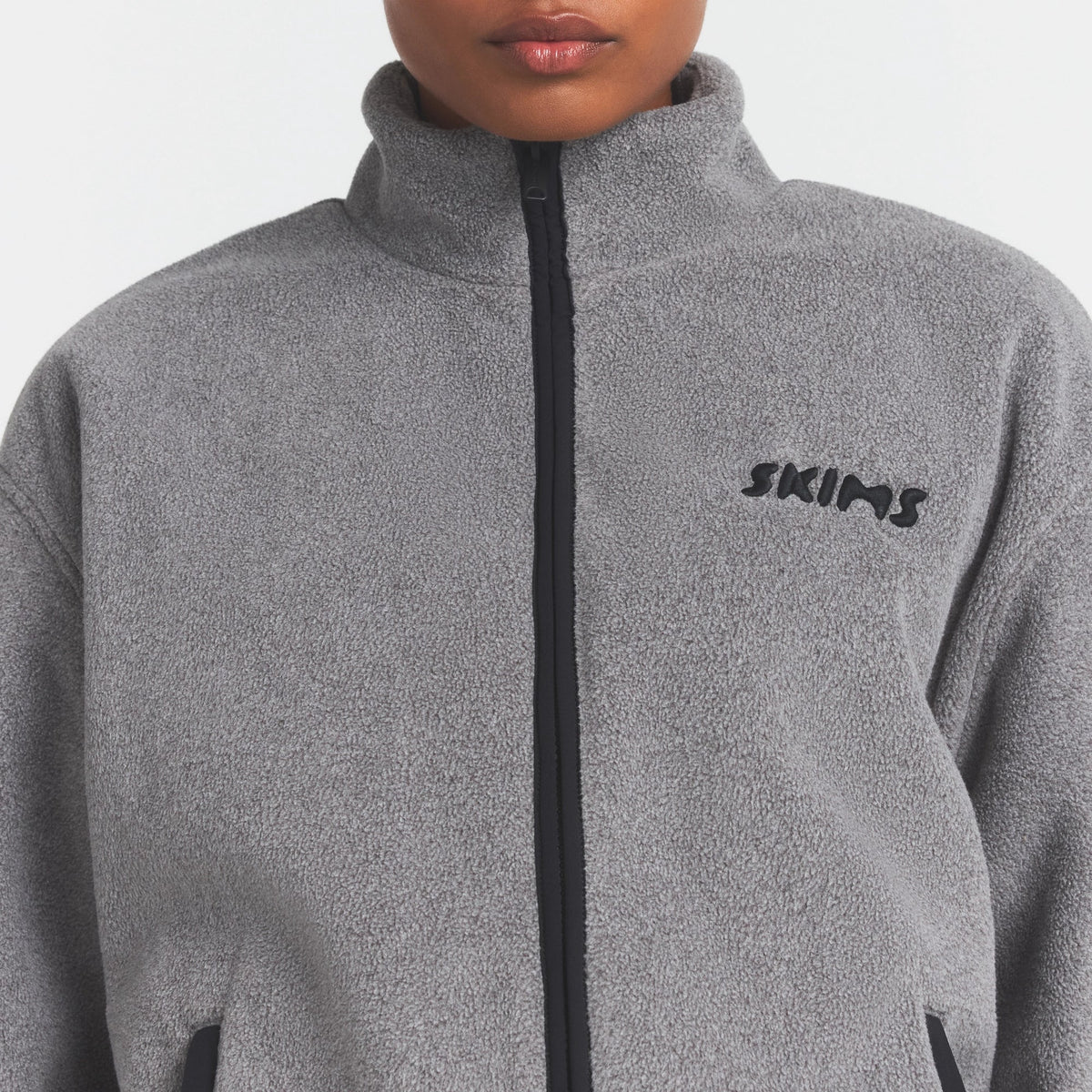 OUTDOOR FLEECE MOCK NECK ZIP UP JACKET | DARK HEATHER GREY ON A MODEL SIDE VIEW @ | FOCUS: 0.0, 1.0, 0.9