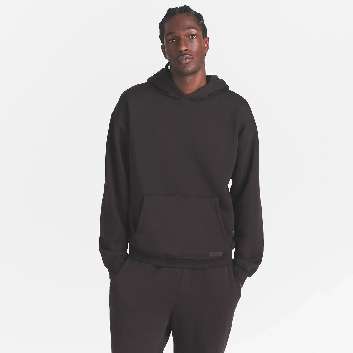 FLEECE LOUNGE MENS RELAXED HOODIE | DARK ROAST ON A MODEL FRONT VIEW @ | FOCUS: 0.0, 1.0, 0.9