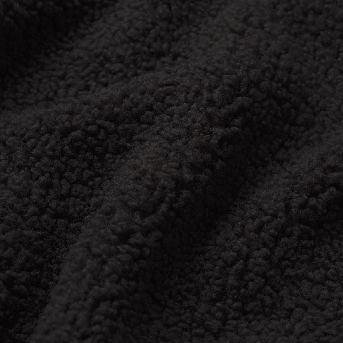 TEDDY BOXY ZIP UP JACKET | ONYX & LAYS FLAT ON A WHITE BACKGROUND | FLT