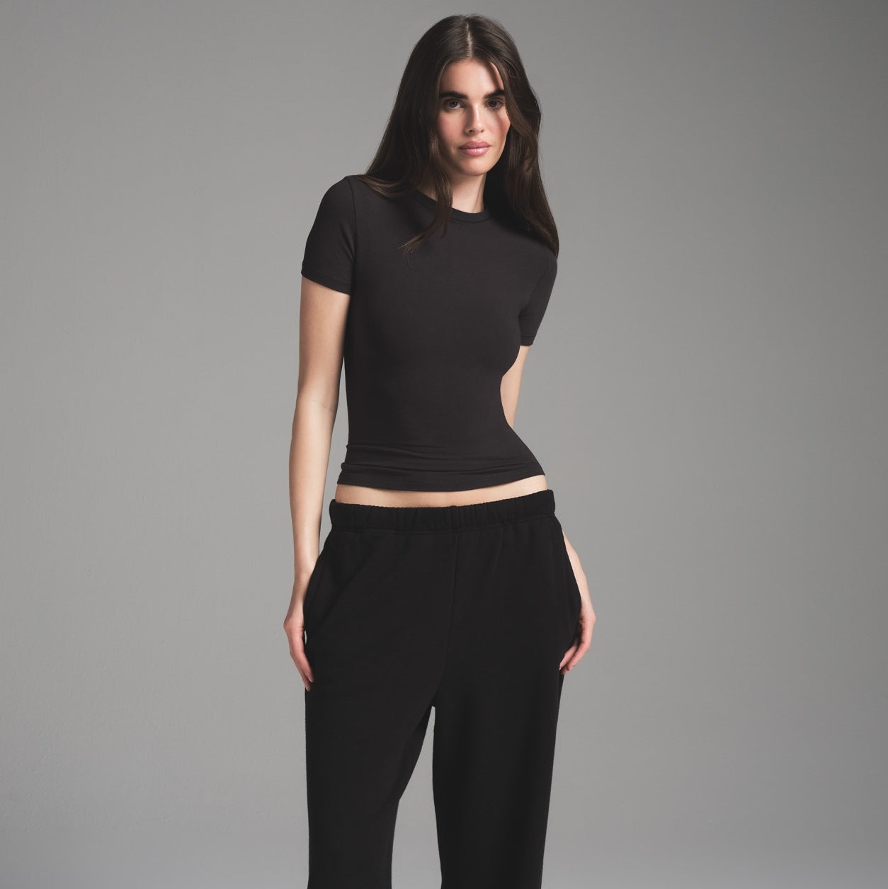 COTTON FLEECE CLASSIC STRAIGHT LEG PANT | ONYX ON A MODEL FRONT VIEW | FOCUS: 0.0, 1.0, 0.9