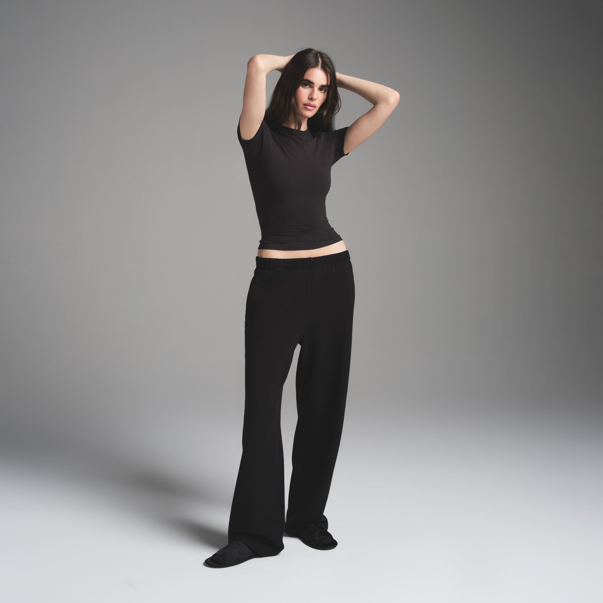 COTTON FLEECE CLASSIC STRAIGHT LEG PANT | ONYX ON A MODEL FRONT VIEW | FOCUS: 0.0, 1.0, 0.9