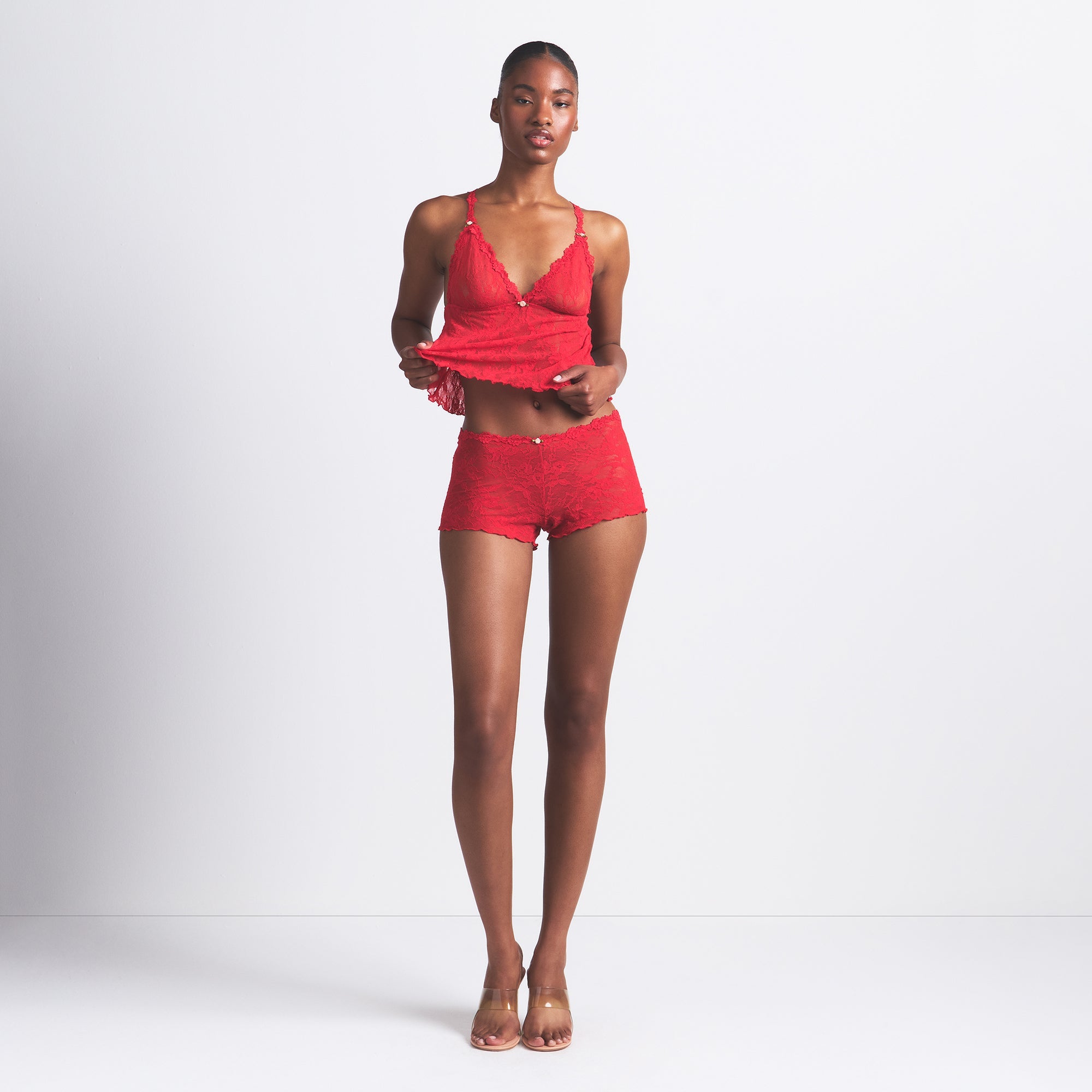 STRETCH LACE TRIANGLE CAMI AND SHORT SET | RED ON A MODEL FRONT VIEW @ | FOCUS: 0.0, 1.0, 0.9