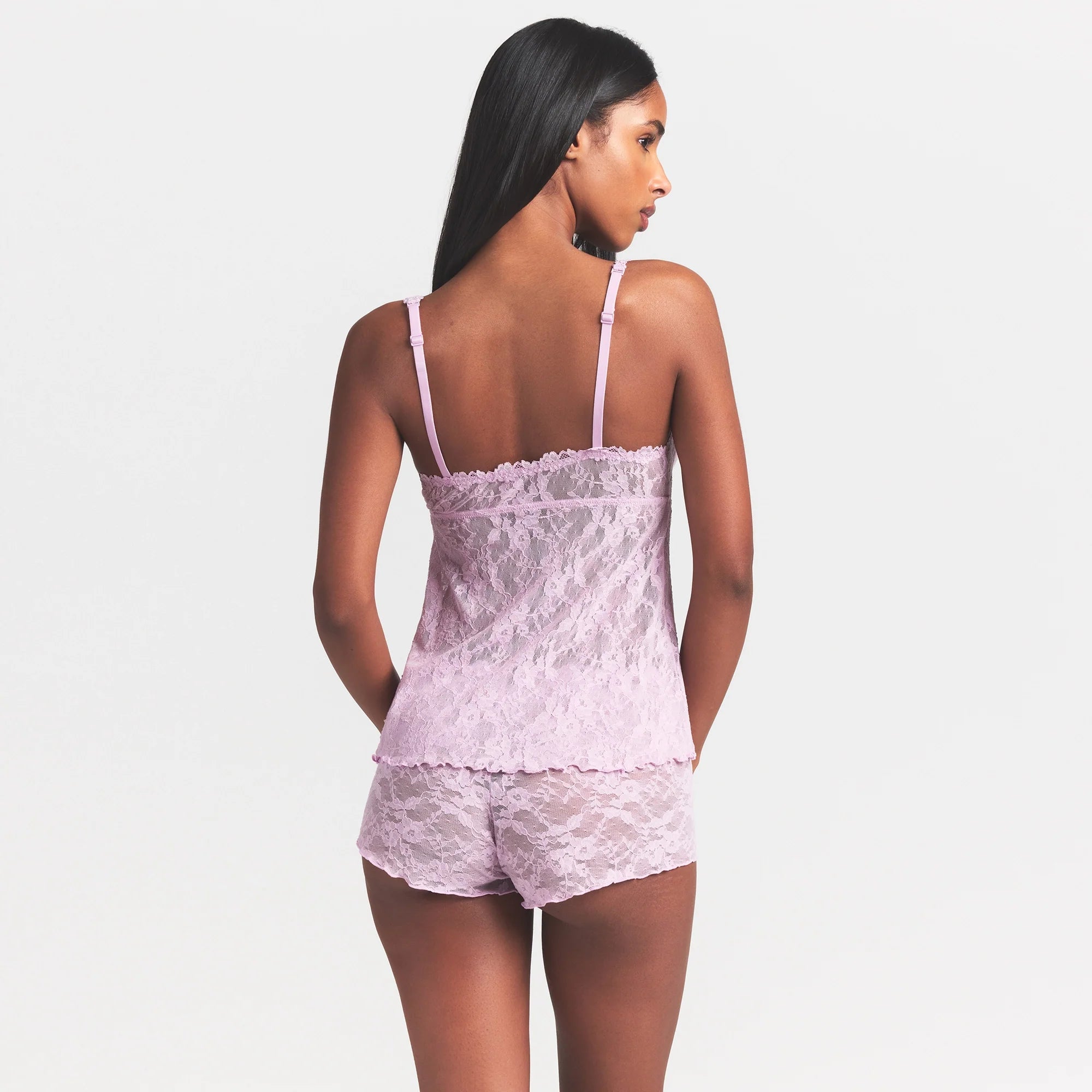 STRETCH LACE BABYDOLL TOP | BABY PINK ON A MODEL SIDE VIEW @ | FOCUS: 0.0, 1.0, 0.9