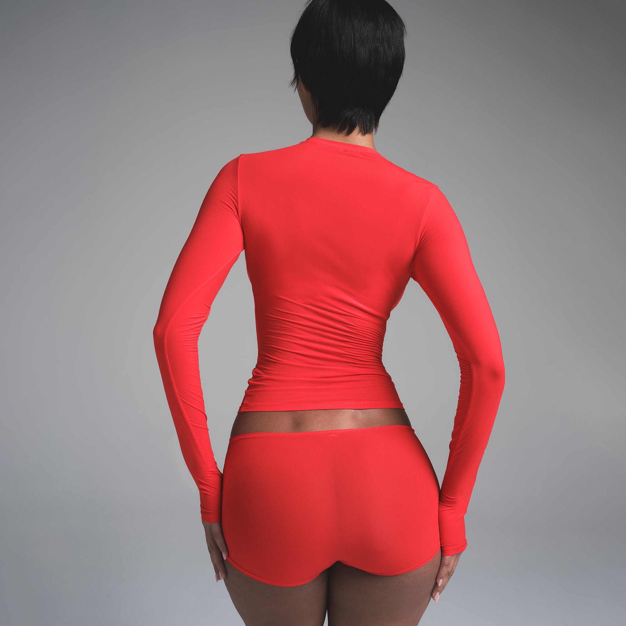 FITS EVERYBODY LONG SLEEVE T-SHIRT | CHERRY ON A MODEL BACK VIEW | FOCUS: 0.0, 1.0, 0.9