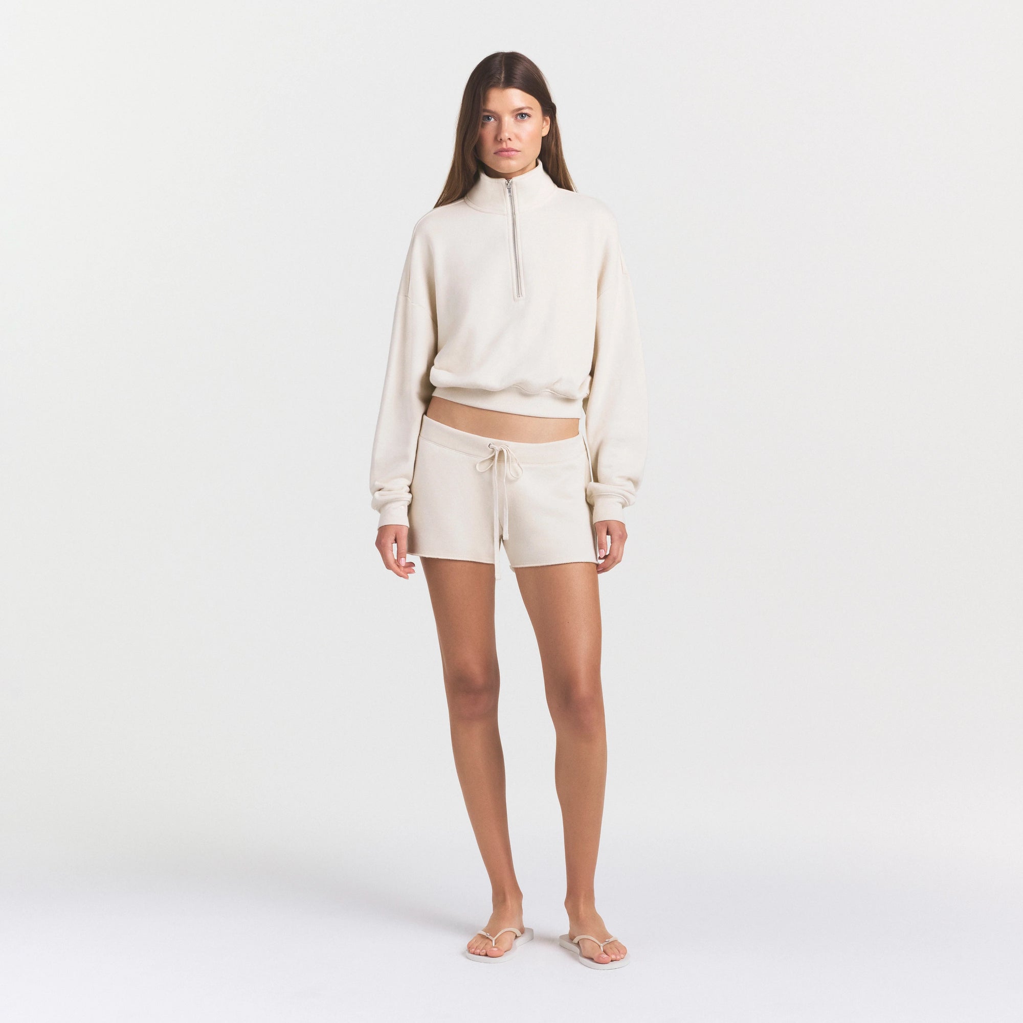 DRAPEY FRENCH TERRY HALF ZIP | BUFF ON A MODEL FRONT VIEW @ | FOCUS: 0.0, 1.0, 0.9