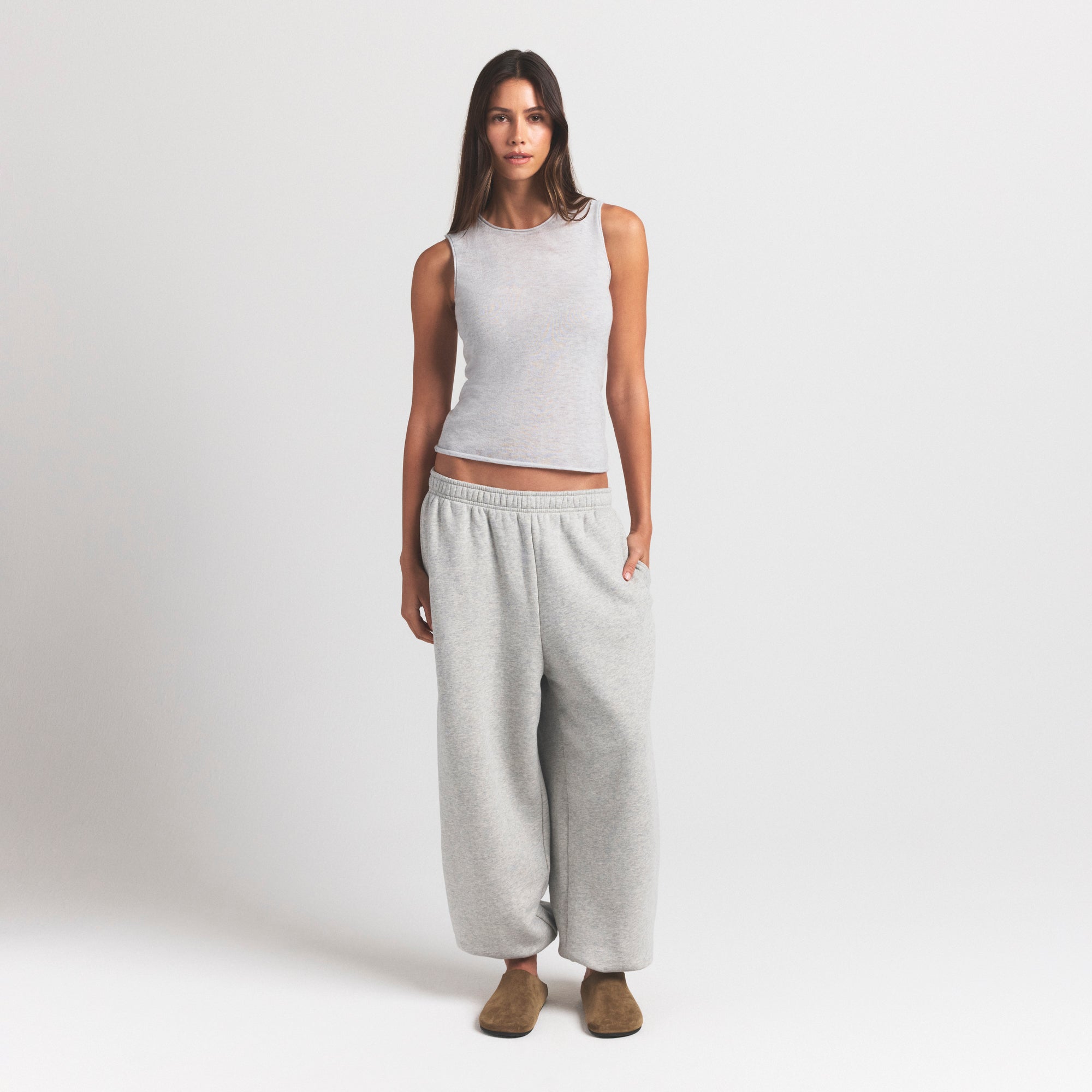 FEATHERWEIGHT CASHMERE SLEEVELESS TOP | LIGHT HEATHER GREY ON A MODEL FRONT VIEW | FOCUS: 0.0, 1.0, 0.9
