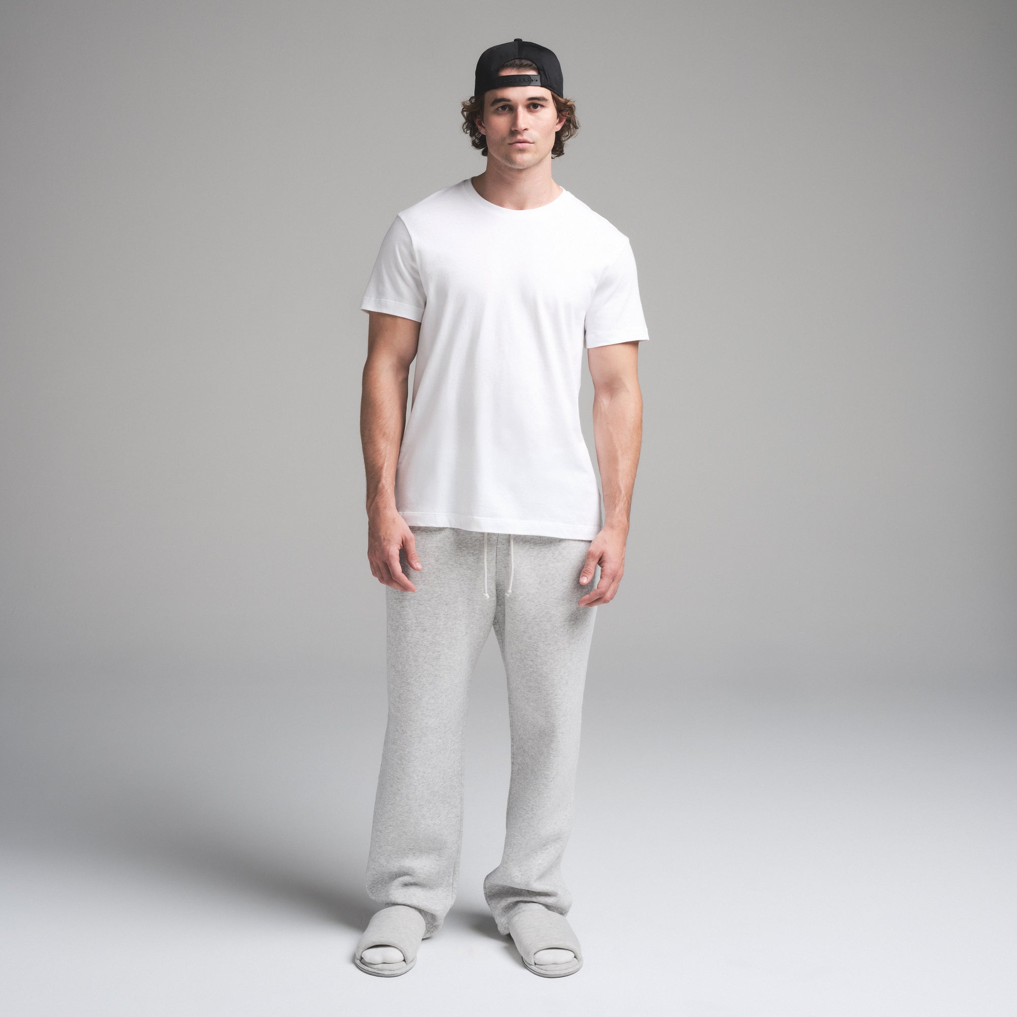 SKIMS COTTON MENS CLASSIC T-SHIRT | CHALK ON A MODEL FRONT VIEW | FOCUS: 0.0, 1.0, 0.9