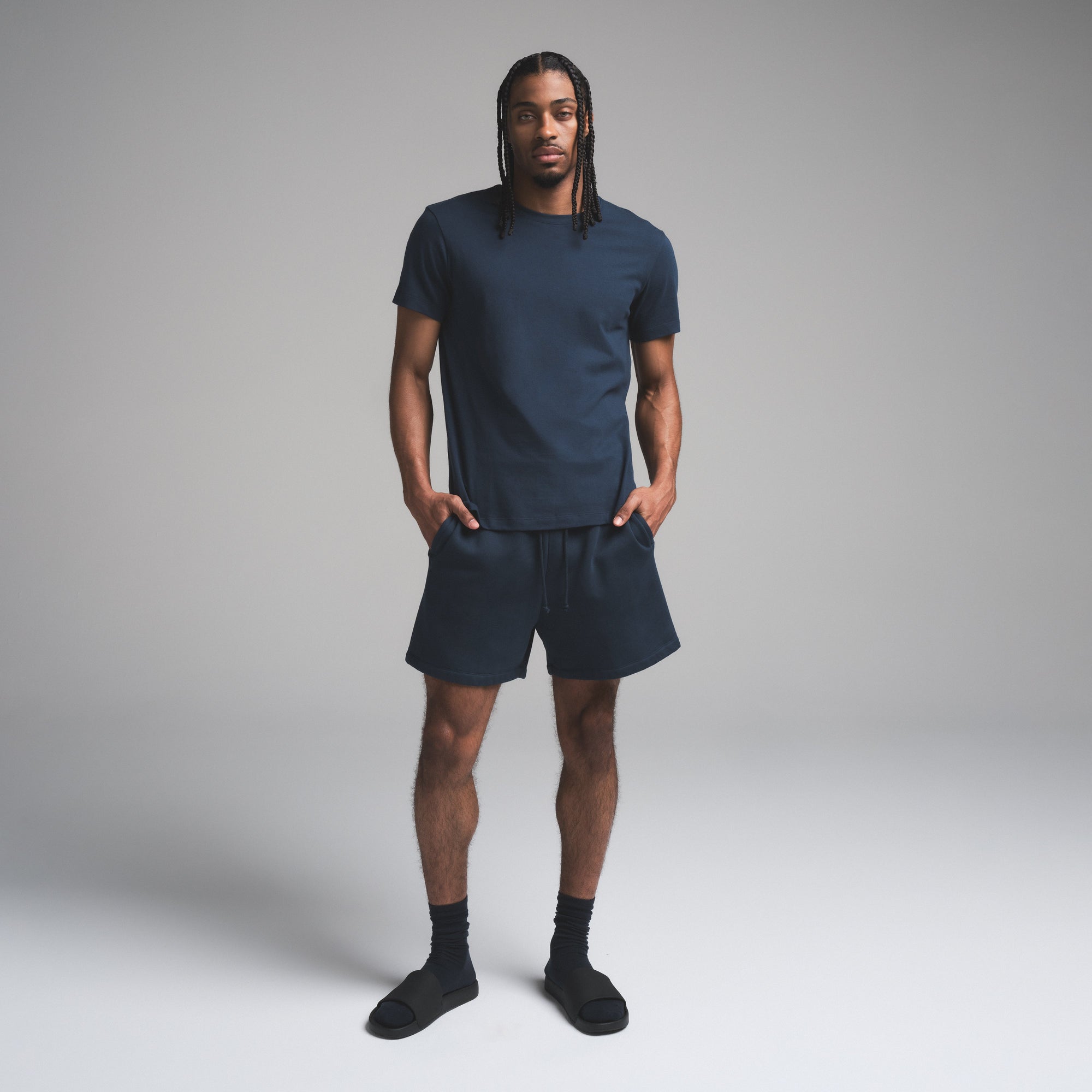 SKIMS COTTON MENS CLASSIC T-SHIRT | NAVY ON A MODEL FRONT VIEW | FOCUS: 0.0, 1.0, 0.9