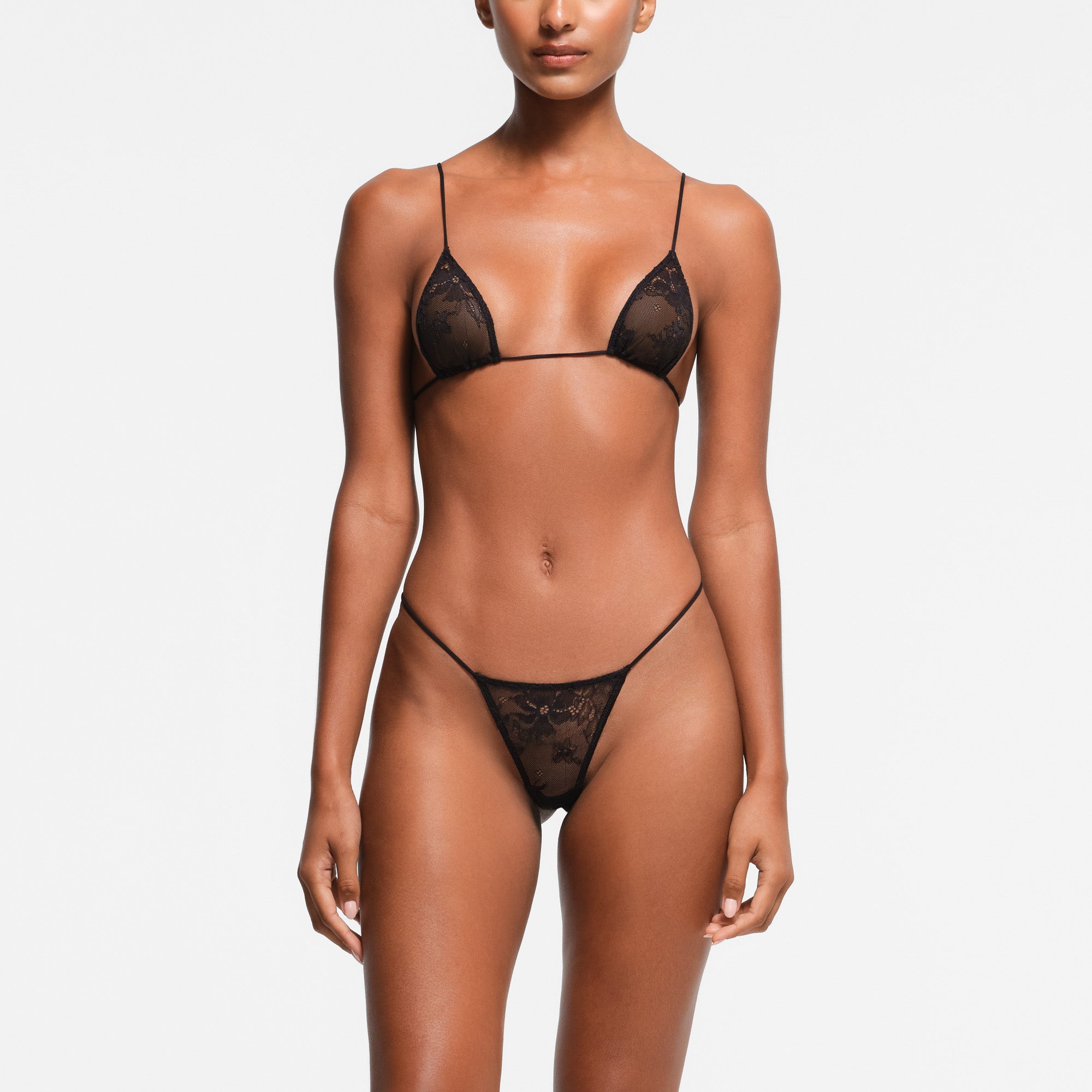 ULTRA FINE LACE MICRO TRIANGLE BRALETTE | ONYX ON A MODEL FRONT VIEW