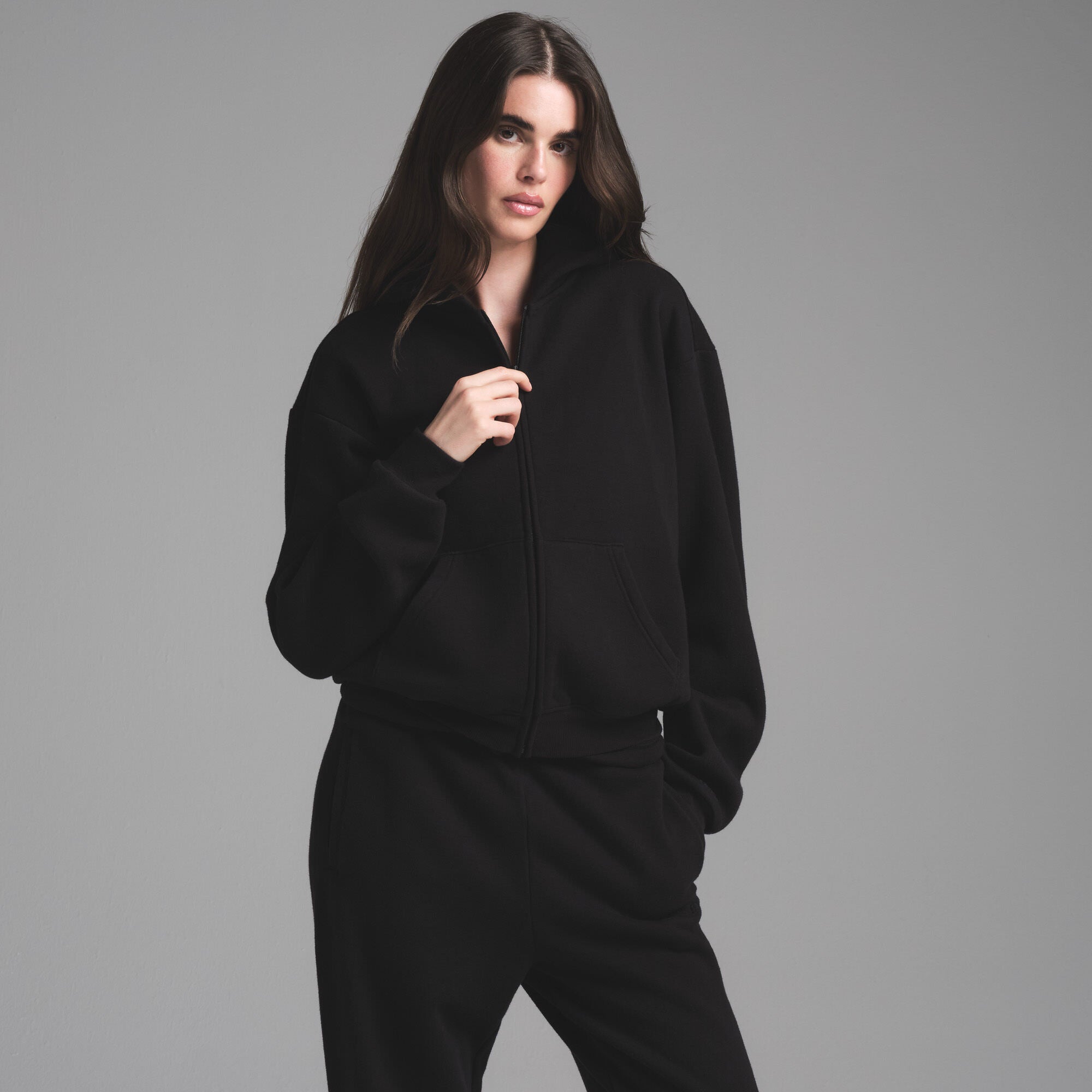 COTTON FLEECE CLASSIC ZIP UP HOODIE | ONYX ON A MODEL FRONT VIEW | FOCUS: 0.0, 1.0, 0.9